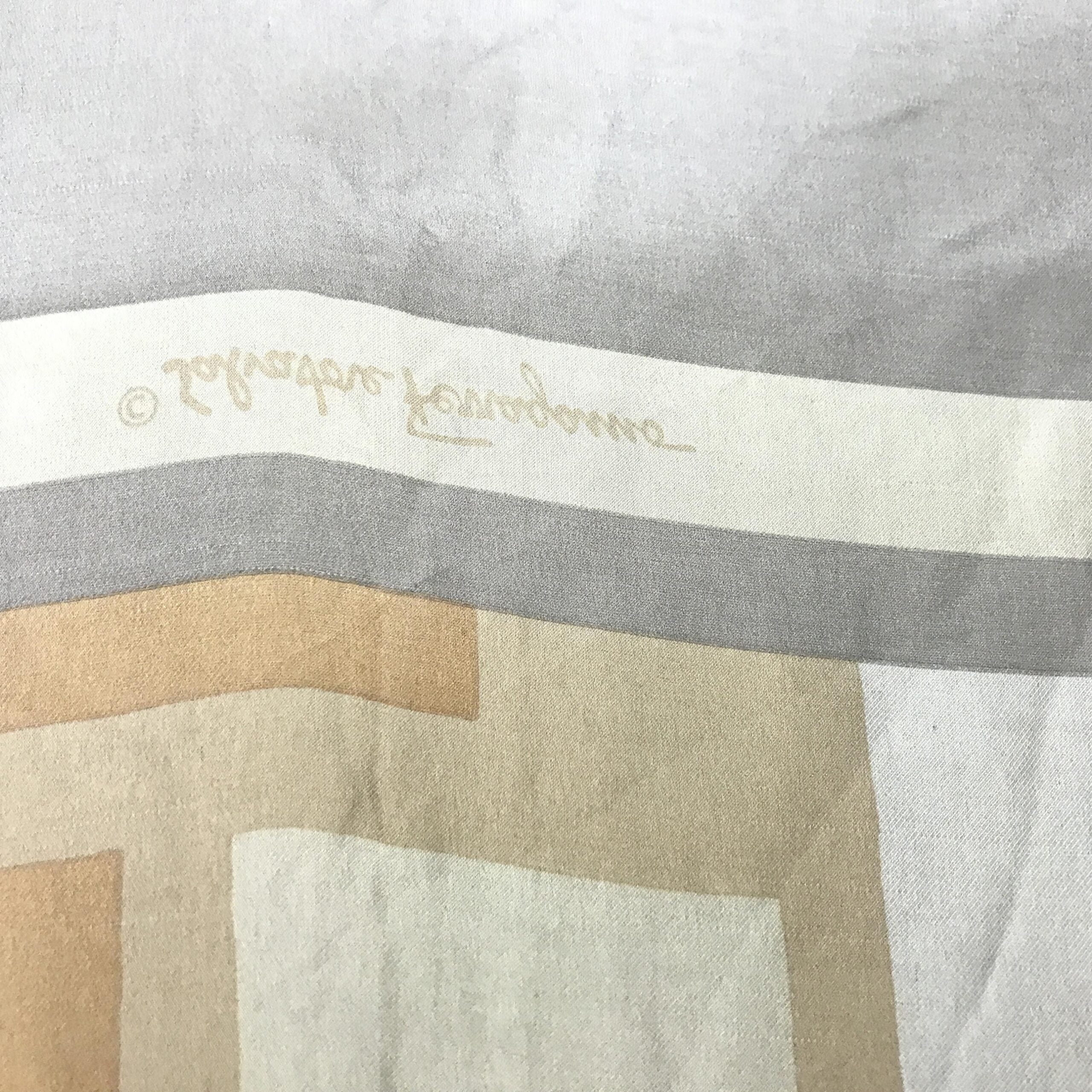 Indulge in the exquisite Salvatore Ferragamo silk scarf, a timeless accessory embodying luxury and elegance, perfect for those who appreciate refined artistry.