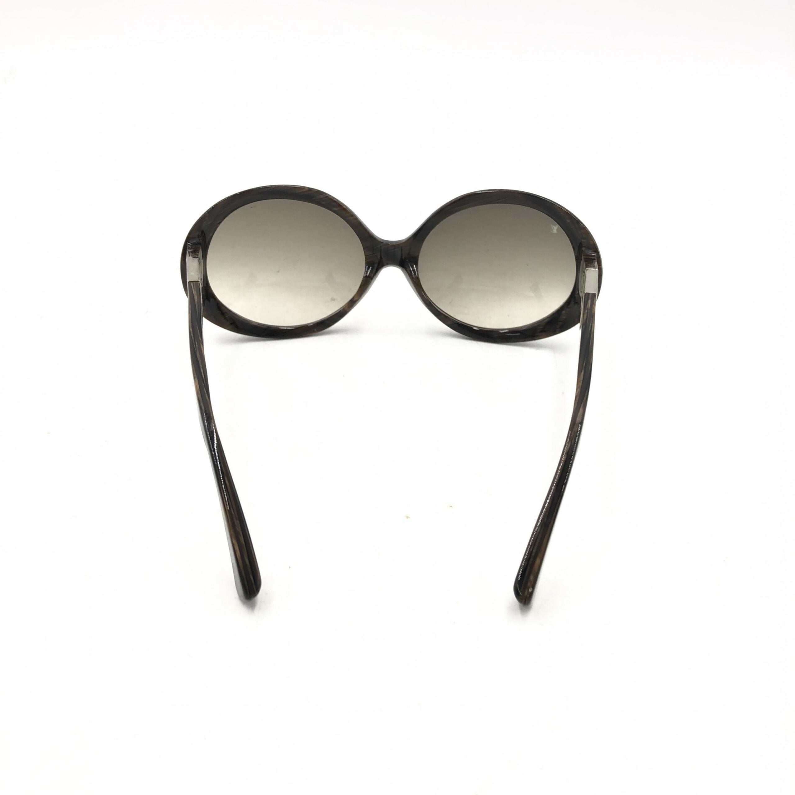 Elevate your style with Louis Vuitton's Suspense BugEye Sunglasses, featuring polarized lenses and exquisite craftsmanship, embodying timeless luxury and sophistication.