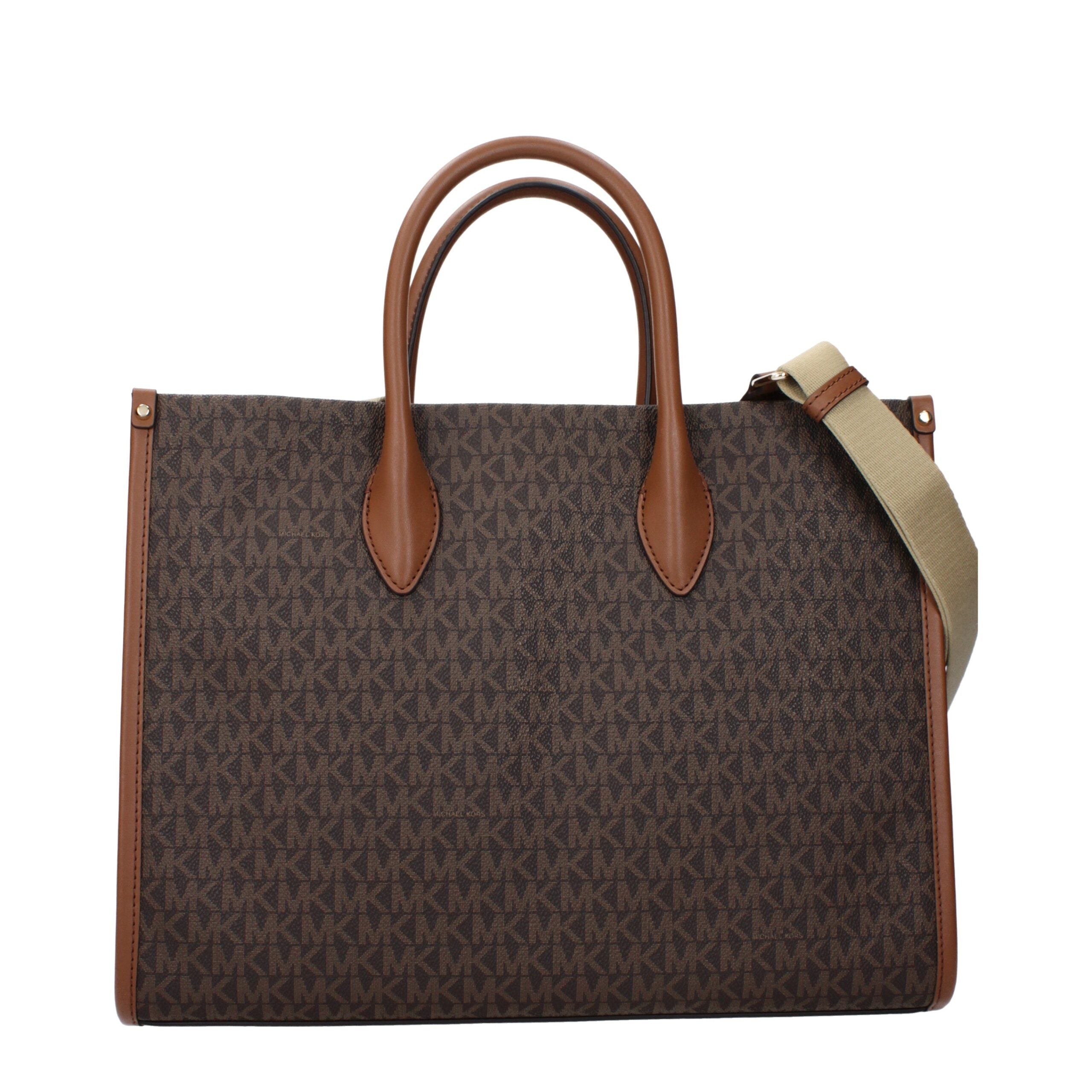 Elevate your elegance with the Michael Kors Brown Fabric Handbag, a timeless blend of luxury and versatility, crafted for those who embody sophistication and style.