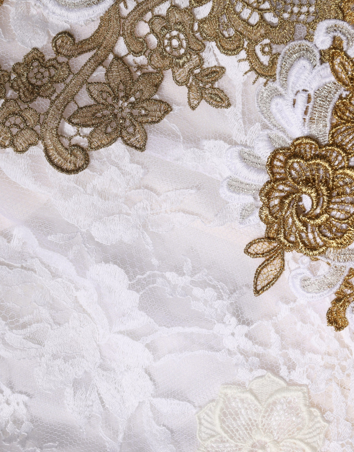 Indulge in the exquisite allure of Dolce & Gabbana's Ivory Lace Silk Embellished Sleeveless Dress, where intricate craftsmanship meets timeless elegance, perfect for any sophisticated occasion.