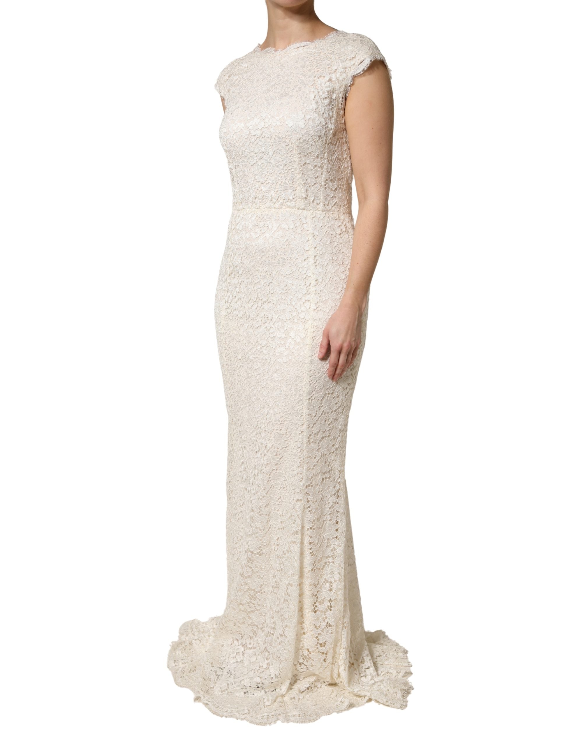 Experience the allure of Dolce & Gabbana's White Lace Viscose Sheath Long Gown, a masterpiece of Italian craftsmanship, perfect for unforgettable moments of elegance.