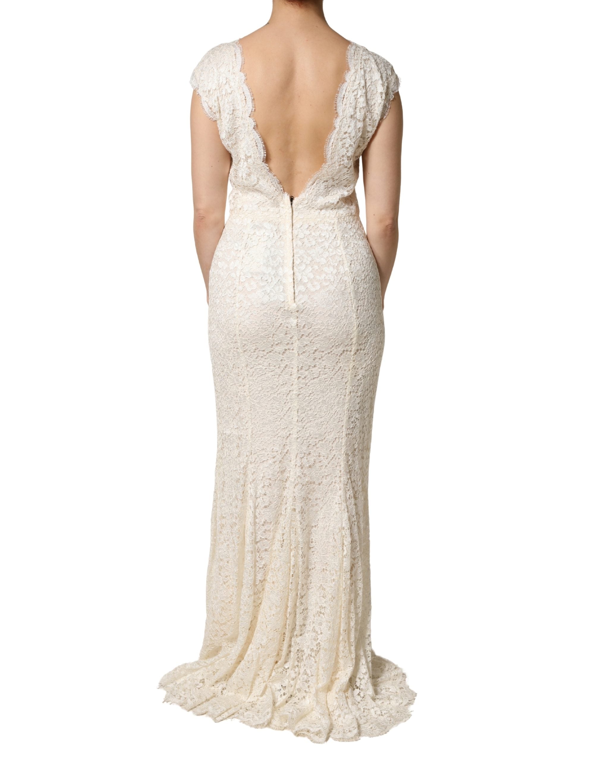 Experience the exquisite allure of Dolce & Gabbana's White Lace Viscose Sheath Long Gown, a masterpiece of Italian craftsmanship that redefines luxury for unforgettable evenings.