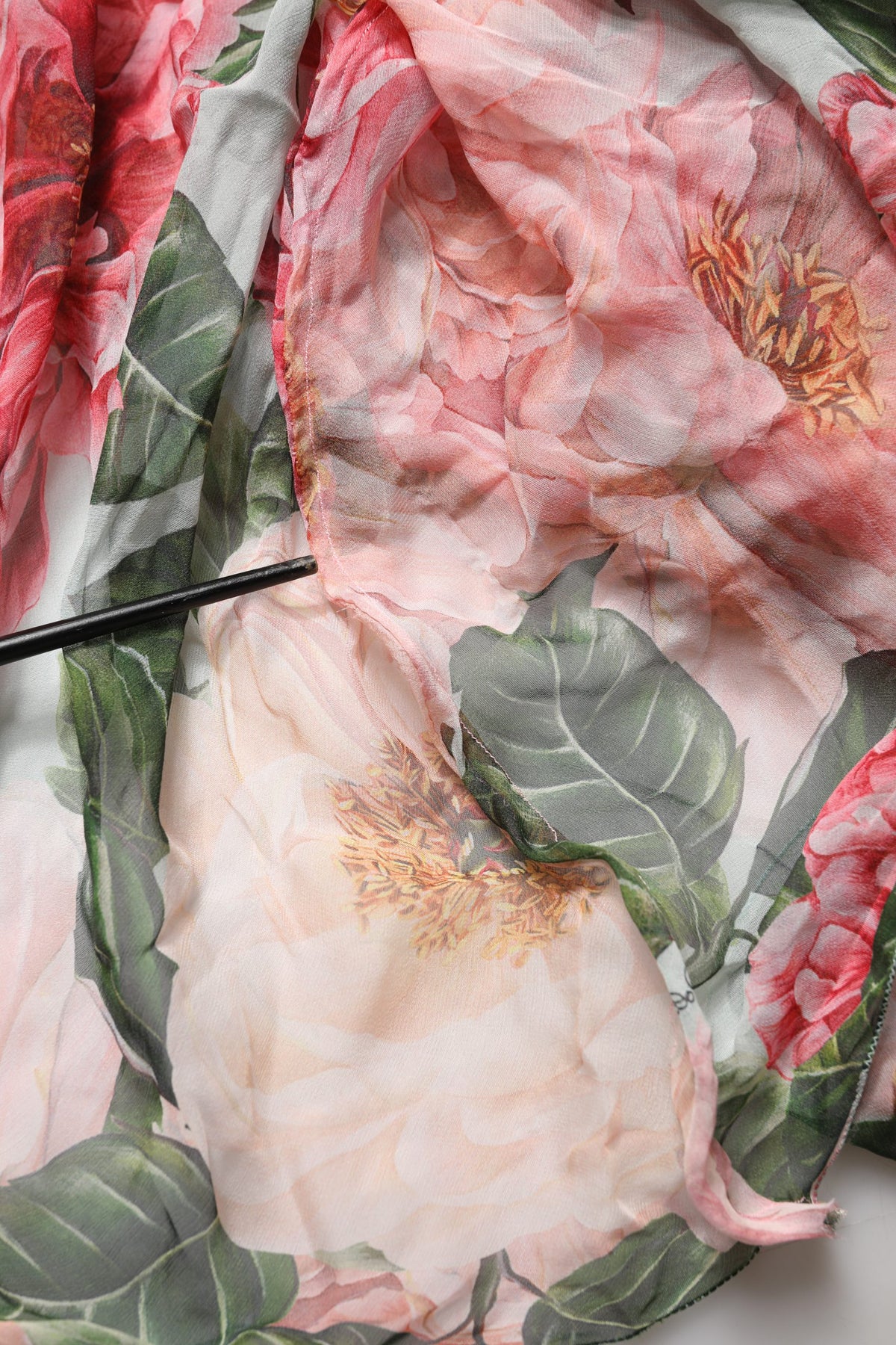 Experience the allure of the Dolce & Gabbana Multicolor Floral Silk Layered Maxi Dress, a masterpiece of Italian craftsmanship that embodies luxury and elegance for unforgettable moments.