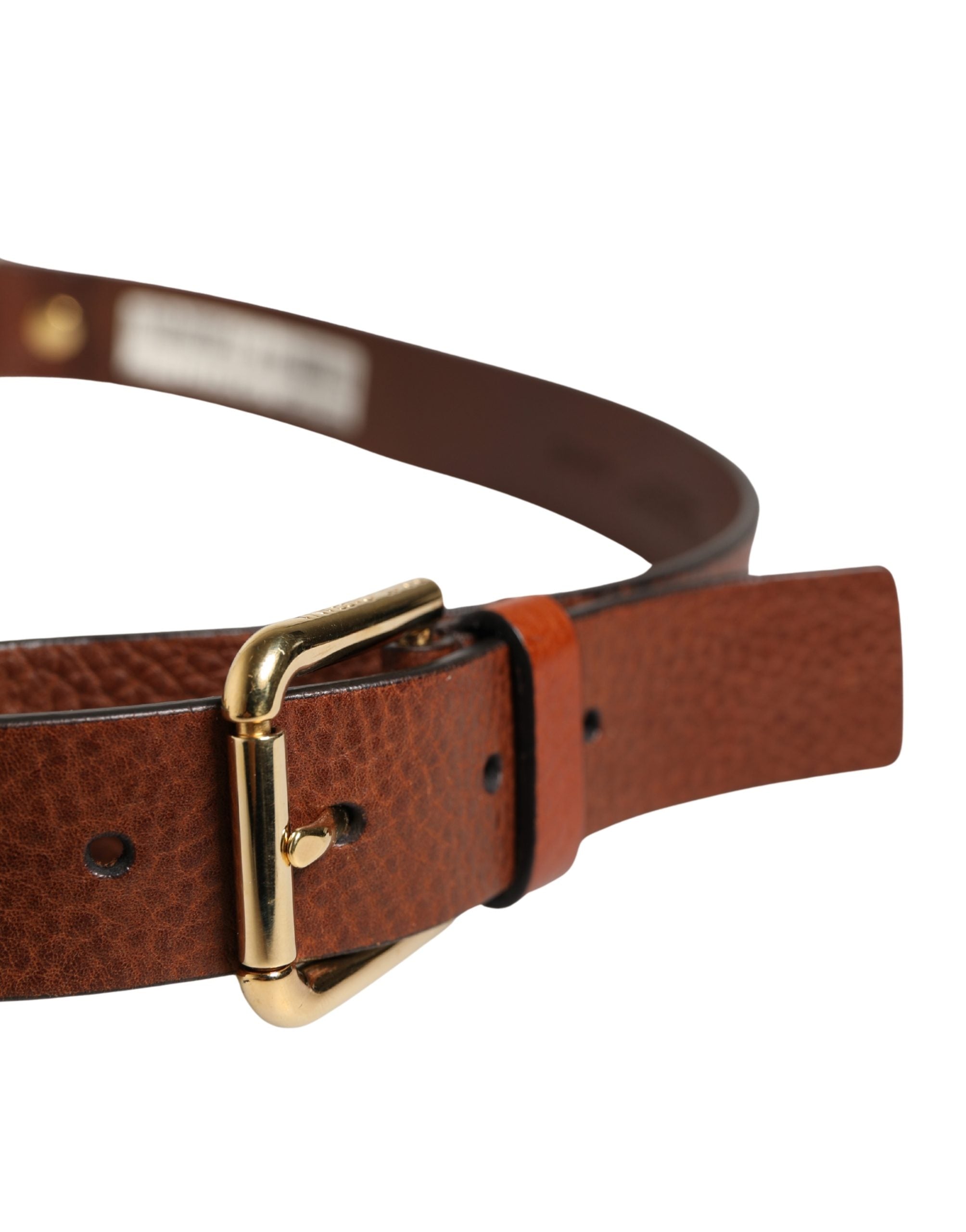 Indulge in the exquisite Dolce & Gabbana Men Brown Classic Leather Metal Buckle Belt, a timeless symbol of luxury and sophistication, crafted from premium calf leather in Italy.