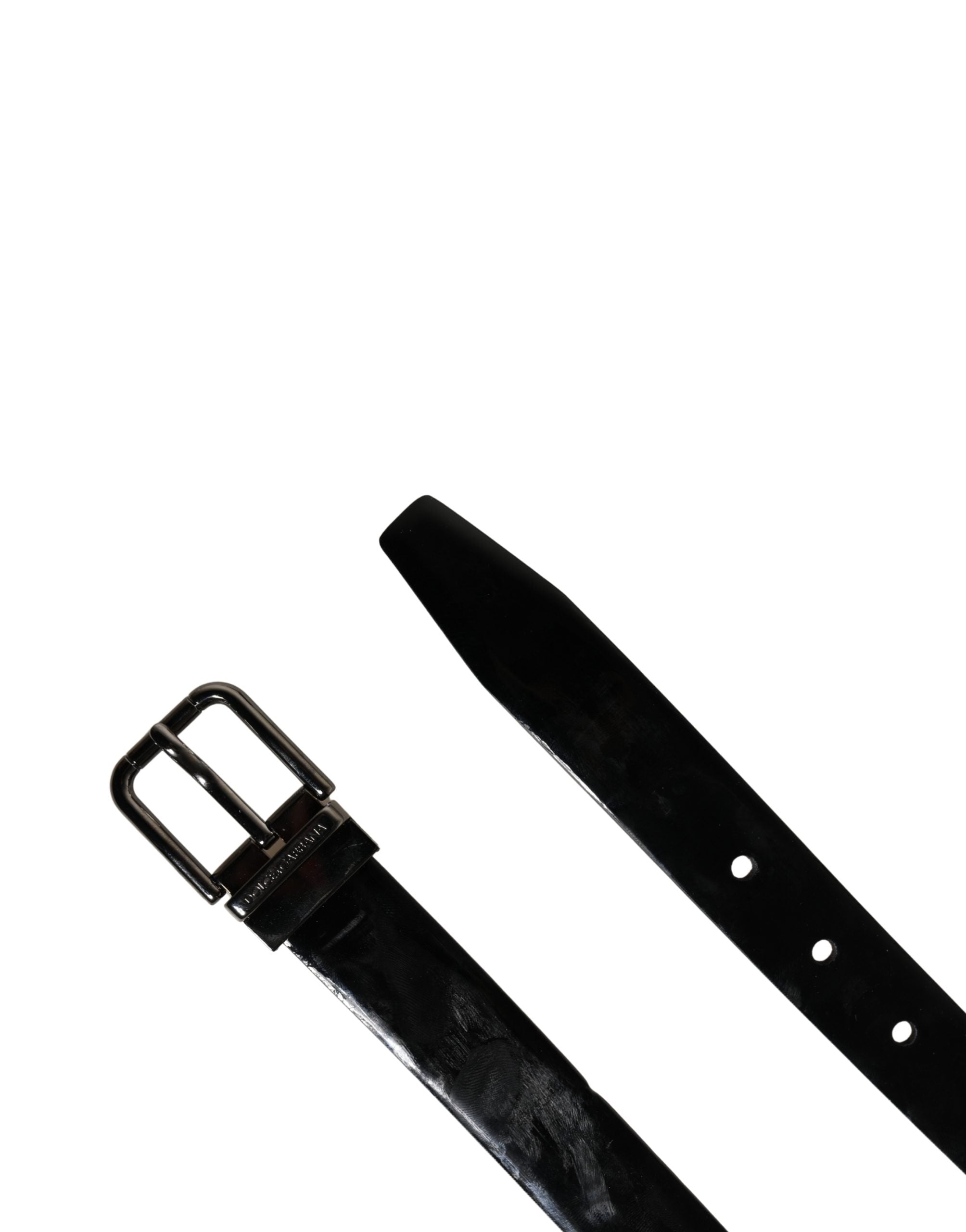 Indulge in the timeless elegance of the Dolce & Gabbana Men Black Classic Leather Metal Buckle Belt, a symbol of opulent craftsmanship and refined sophistication.