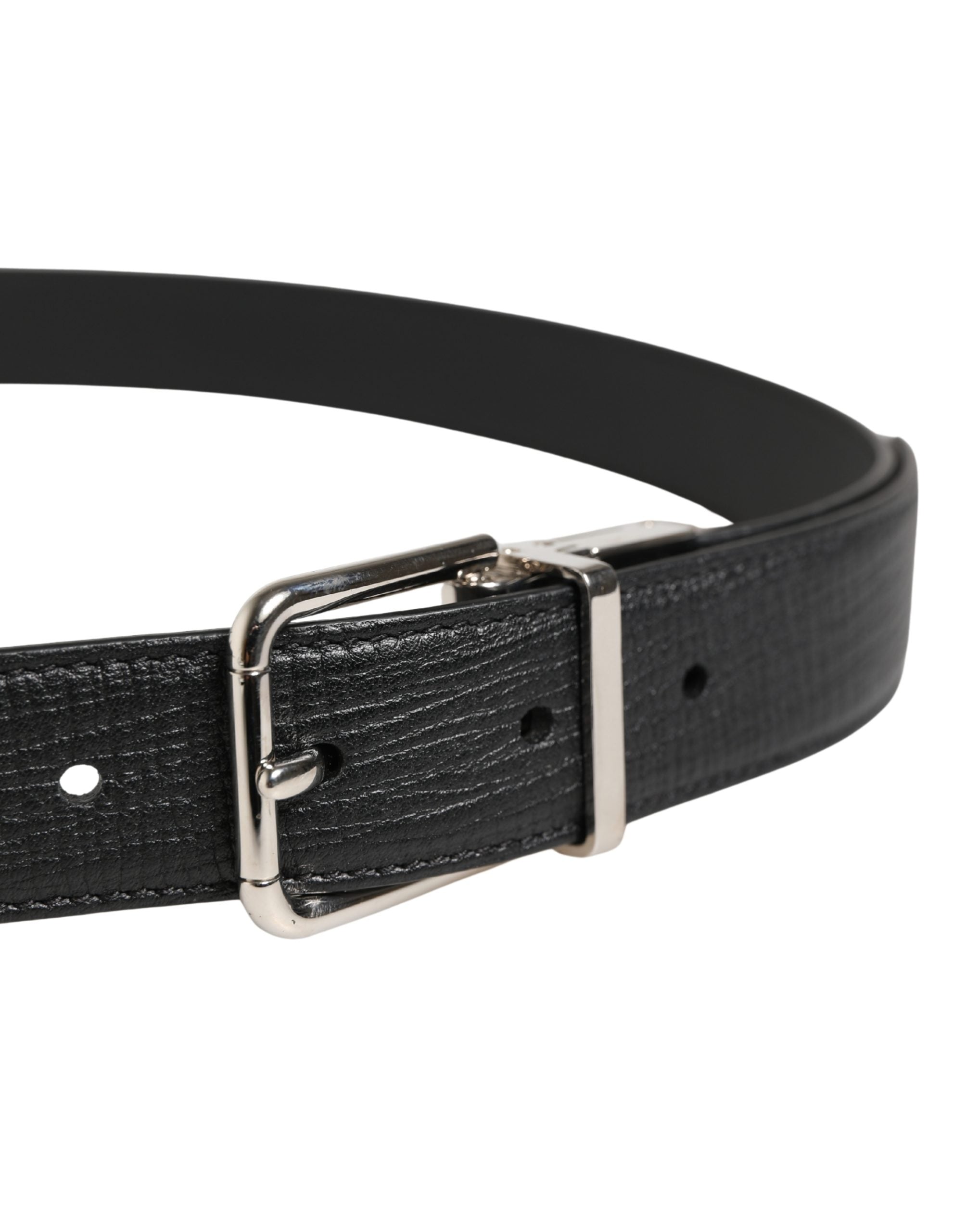 Elevate your style with the Dolce & Gabbana Men Black Classic Leather Metal Buckle Belt, a masterpiece of Italian craftsmanship in luxurious calf leather, perfect for discerning tastes.