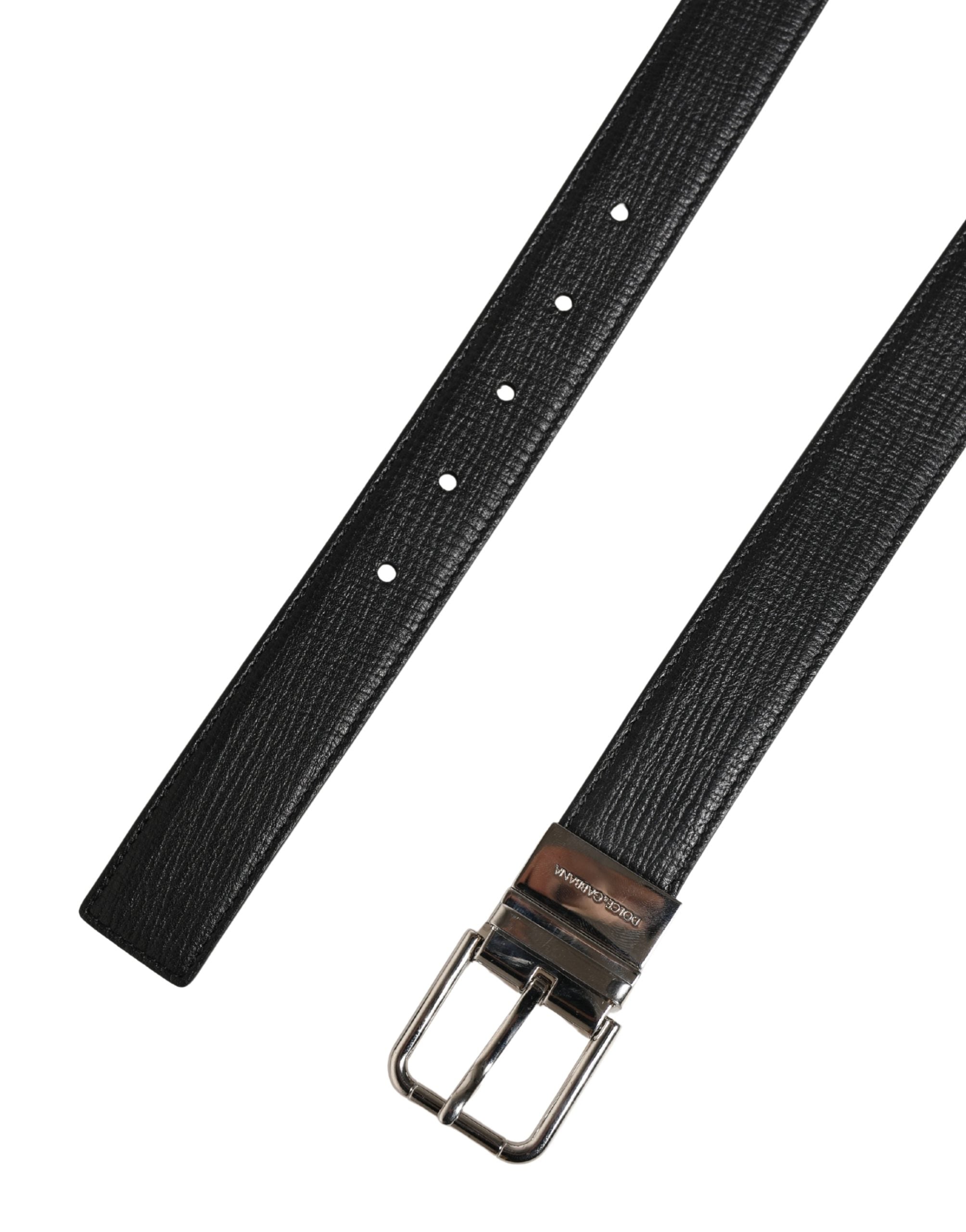 Elevate your style with the Dolce & Gabbana Men Black Classic Leather Metal Buckle Belt, a masterpiece of Italian craftsmanship in luxurious calf leather, embodying timeless elegance.