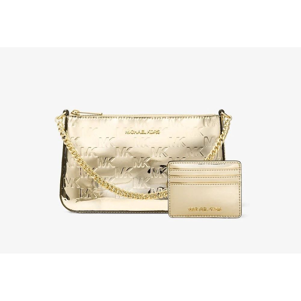 Discover the Michael Kors Gold Canvas Clutch Bag, a symbol of elegance and sophistication, perfect for elevating your style at any upscale event.