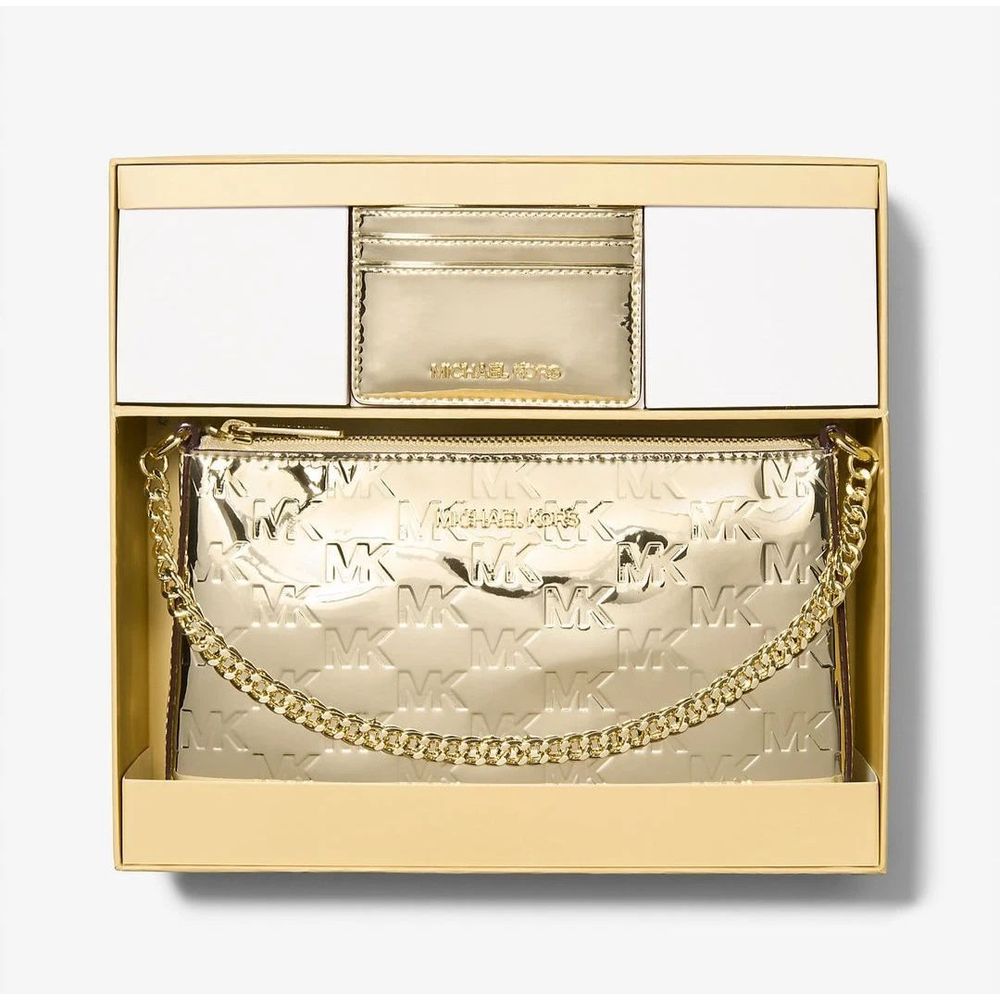 Discover the Michael Kors Gold Canvas Clutch Bag, a symbol of refined luxury and artistry, perfect for elevating any evening ensemble with its exquisite golden sheen.