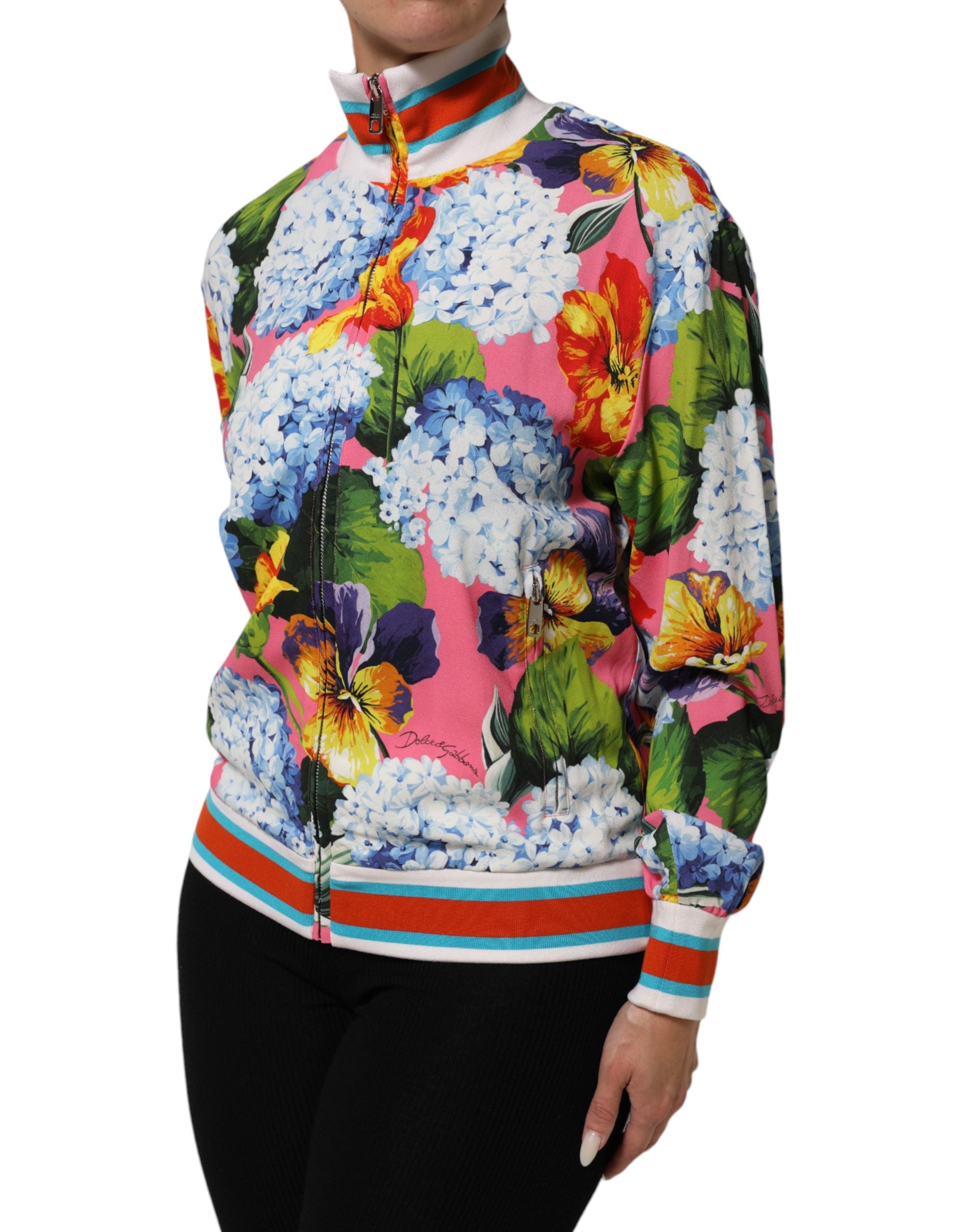 Elevate your wardrobe with the Dolce & Gabbana Multicolor Floral Print Zip Cardigan Jacket, a luxurious blend of 96% viscose and 4% elastane, crafted in Italy for the discerning connoisseur.