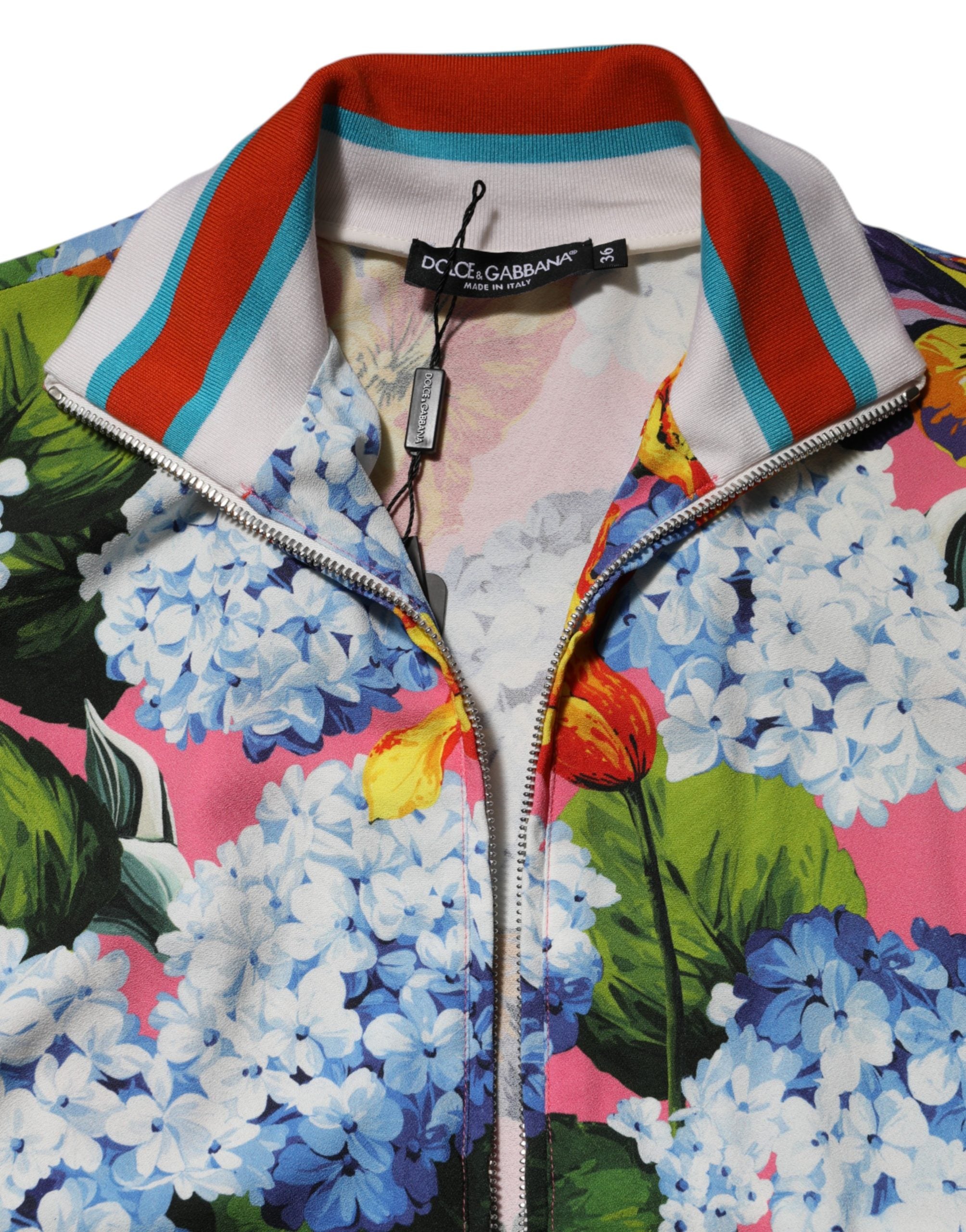 Elevate your wardrobe with the Dolce & Gabbana Multicolor Floral Print Zip Cardigan Jacket, a masterpiece of Italian craftsmanship in luxurious viscose and elastane.