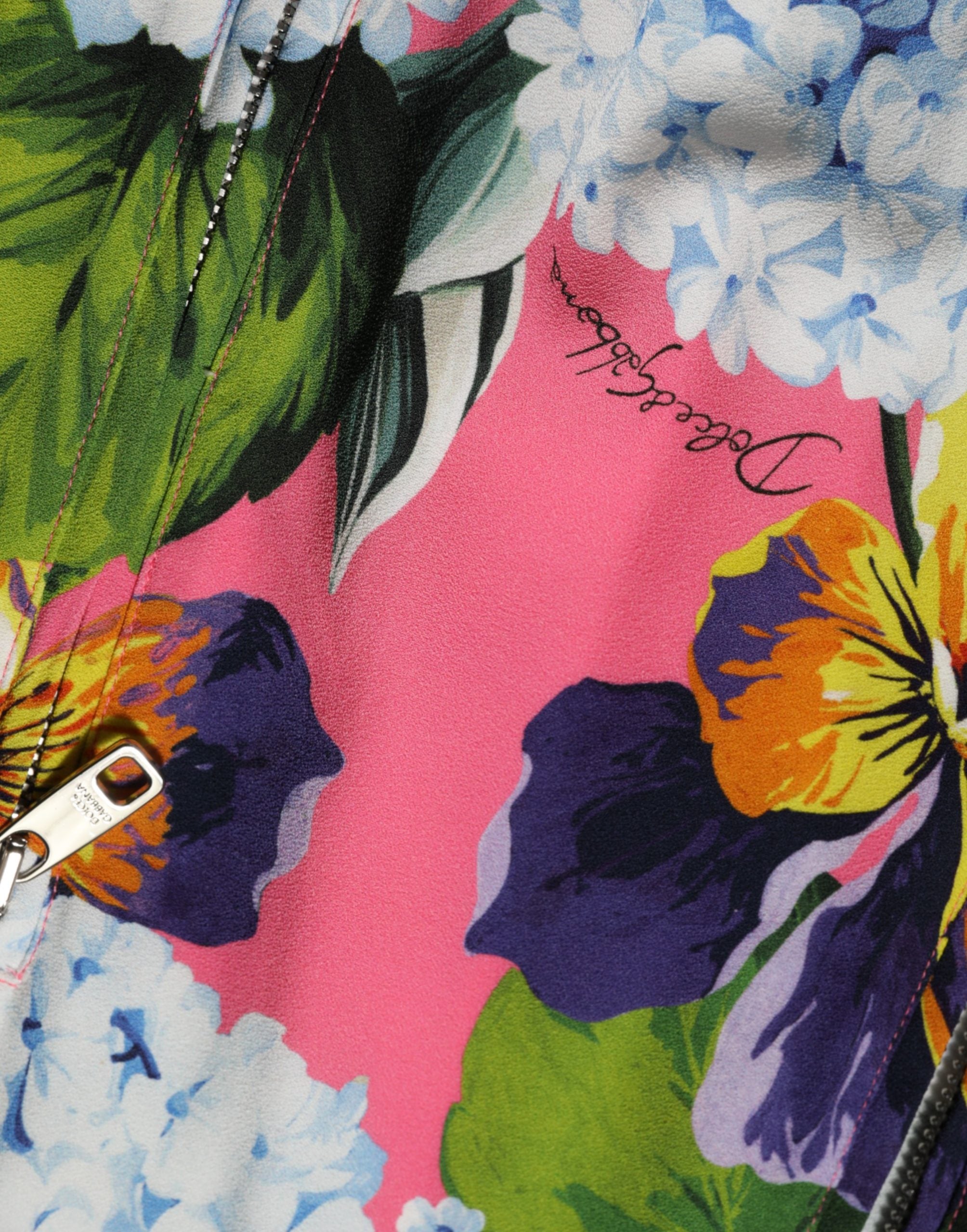 Elevate your wardrobe with the Dolce & Gabbana Multicolor Floral Print Zip Cardigan Jacket, a masterpiece of Italian craftsmanship in luxurious viscose and elastane.