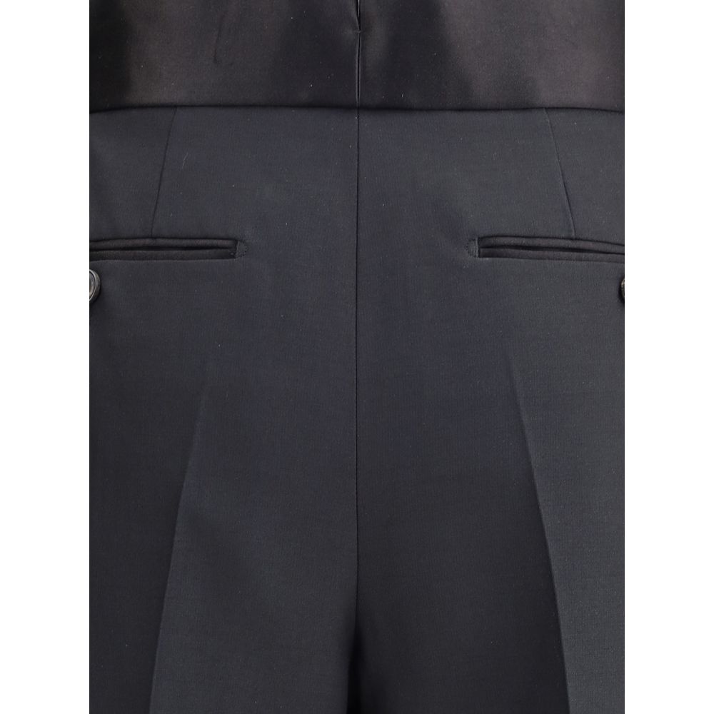 Indulge in the exquisite allure of Tom Ford Gold Silk Pants, crafted from sumptuous silk and wool for a luxurious fit that elevates your every moment.