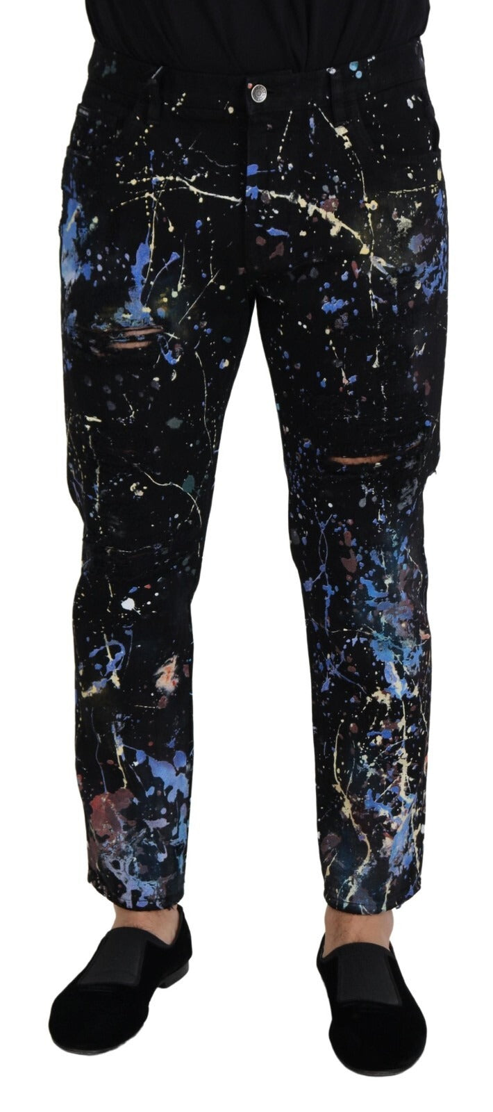 Indulge in the exquisite artistry of Dolce & Gabbana's Black Cotton Color Splash Print Denim Jeans, where luxury meets bold expression for a timeless, sophisticated wardrobe.