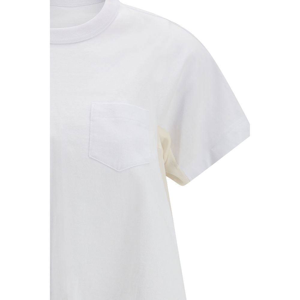 Elevate your wardrobe with the Sacai White Cotton T-Shirt from the SS26 collection, featuring exquisite paneled craftsmanship in luxurious cotton and denim for timeless sophistication.