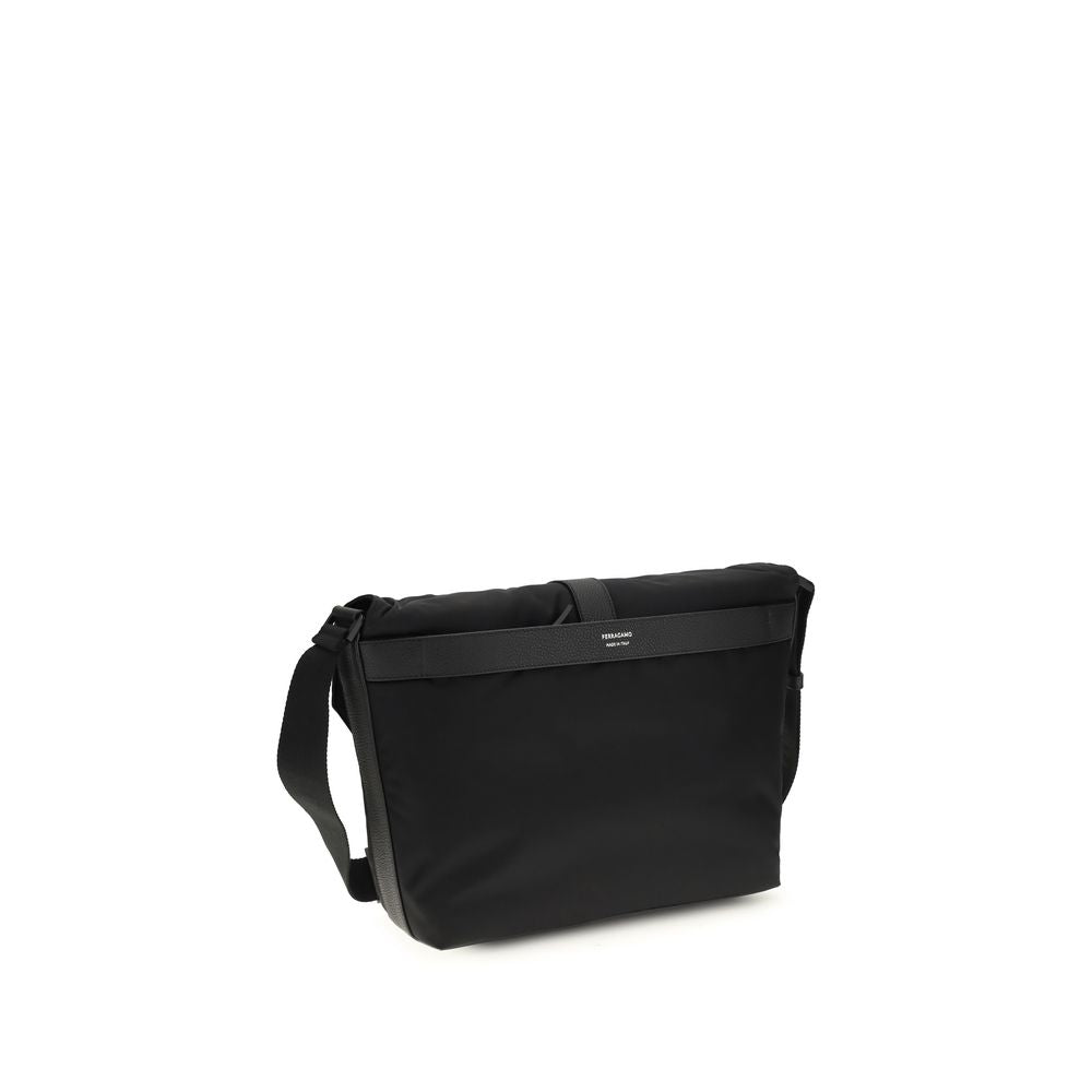 Discover the Ferragamo Black Nylon Handbag, a masterpiece of sophistication and versatility, crafted for those who embrace luxury in everyday elegance.