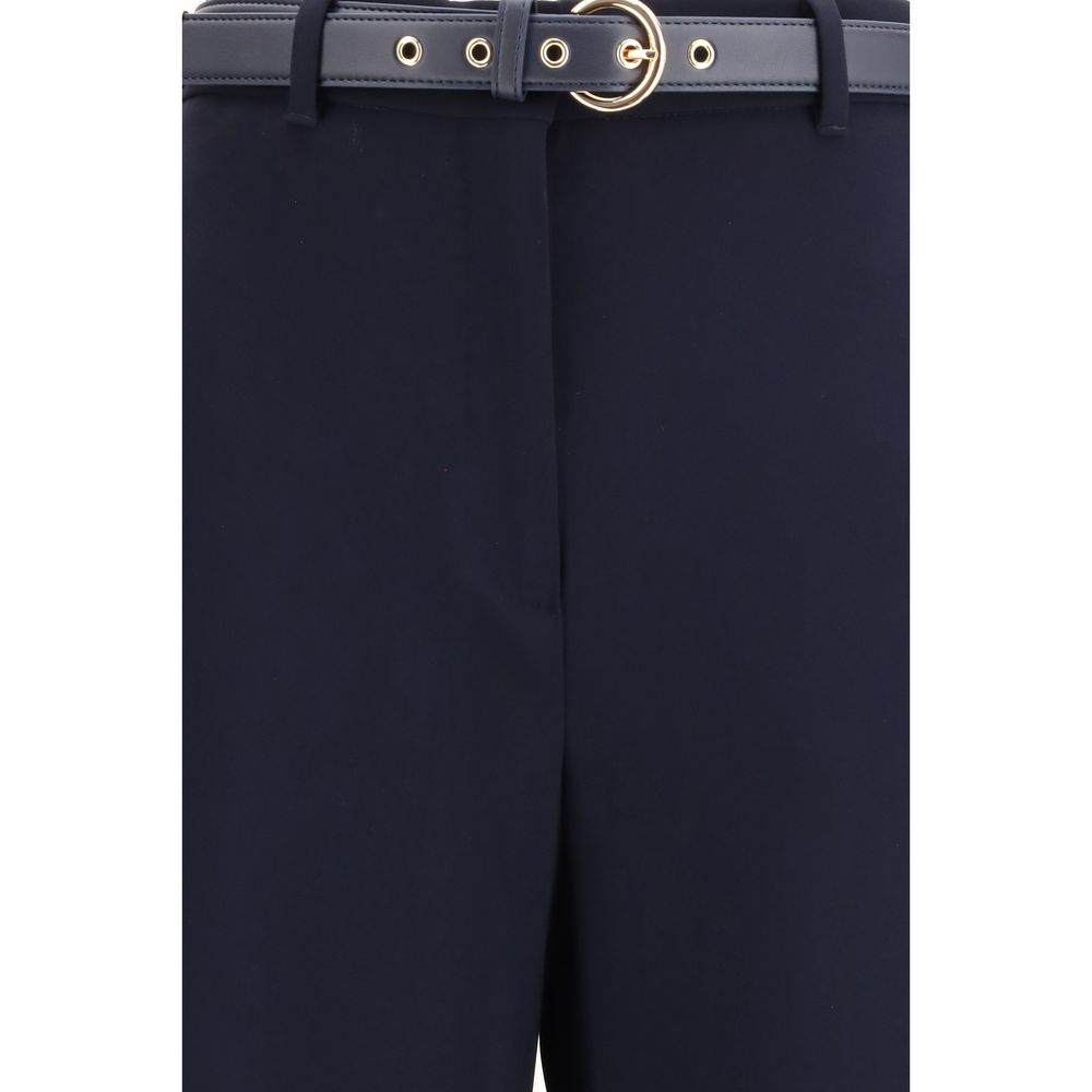 Elevate your wardrobe with the Max Mara Blue Triacetate Top, a masterpiece of refined tailoring in luxurious triacetate, perfect for the discerning fashion aficionado.