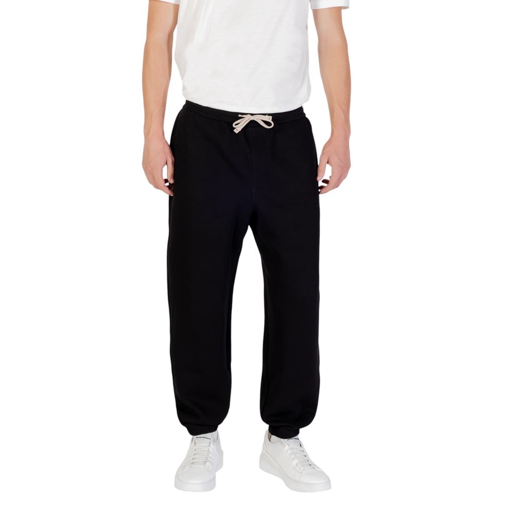 Discover the Armani Exchange Black Cotton Joggers, a luxurious blend of comfort and style, perfect for the modern gentleman's active lifestyle and refined elegance.