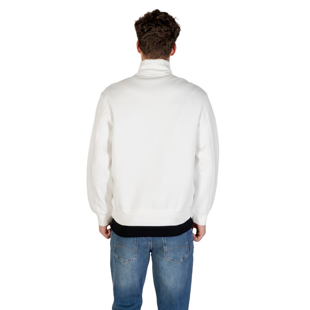 Indulge in the luxurious Armani Exchange Cream Cotton Sweatshirt, crafted for refined comfort and modern elegance, perfect for the discerning individual.