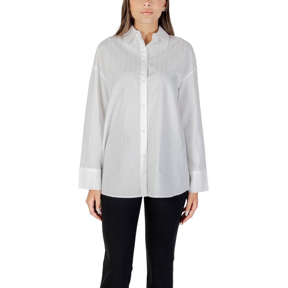 Elevate your style with the Armani Exchange White Cotton Blouse, a luxurious blend of comfort and sophistication, perfect for any discerning wardrobe.