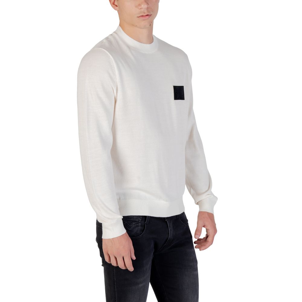 Indulge in the Armani Exchange White Marabou Sweatshirt, a luxurious blend of acrylic and wool that embodies timeless elegance and sophistication for every discerning wardrobe.
