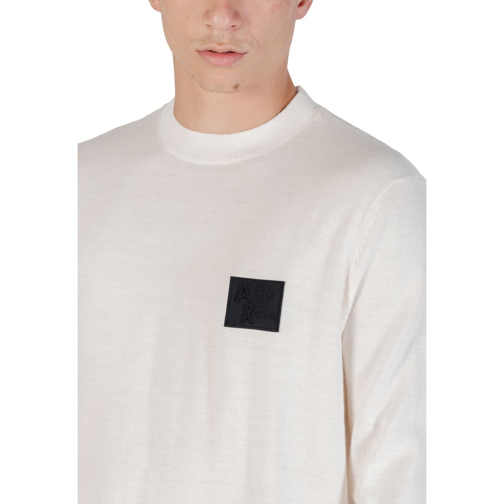 Elevate your wardrobe with the Armani Exchange White Marabou Sweatshirt, a luxurious blend of acrylic and wool, embodying timeless elegance and sophisticated comfort.