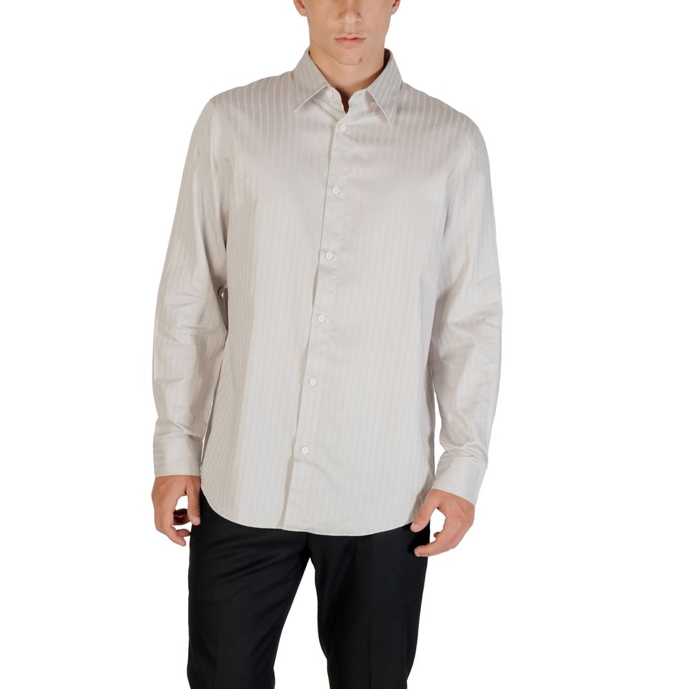 Elevate your wardrobe with the Armani Exchange Gray Cotton Pattern Shirt, crafted from luxurious cotton for timeless elegance and unparalleled comfort in every occasion.