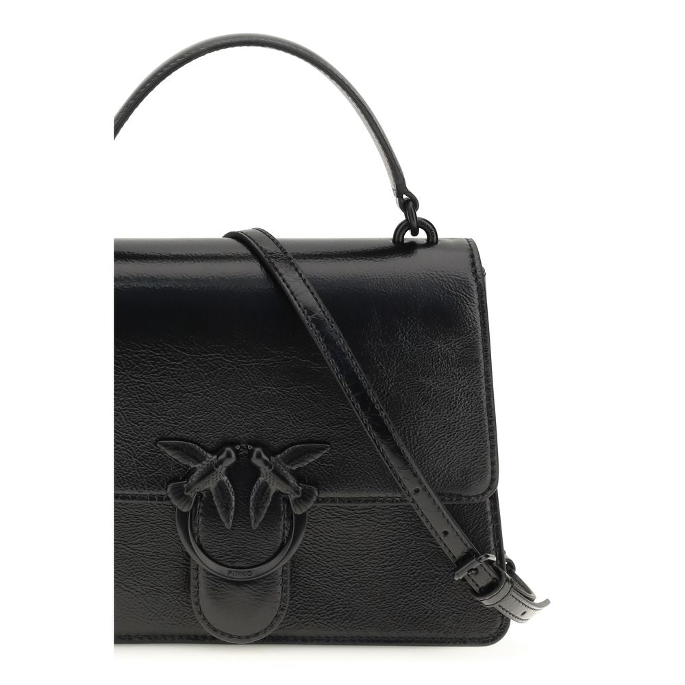 Discover the PINKO Black Lamb Ovis Aries Aries Handbag, a timeless luxury crafted from exquisite leather, perfect for the discerning individual seeking elegance and sophistication.