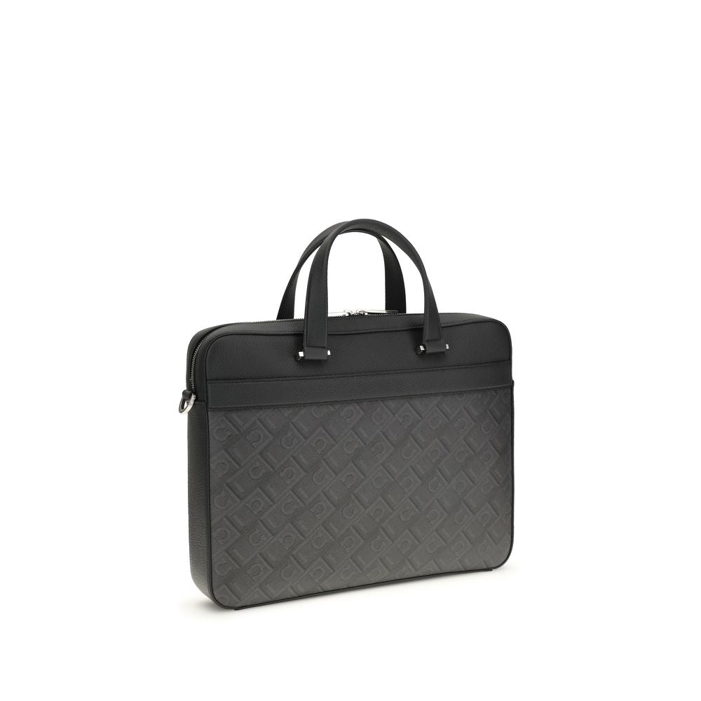 Discover the Ferragamo Gray Calf Leather Bos Taurus Briefcase, a masterpiece of craftsmanship blending luxury and functionality for the discerning professional.