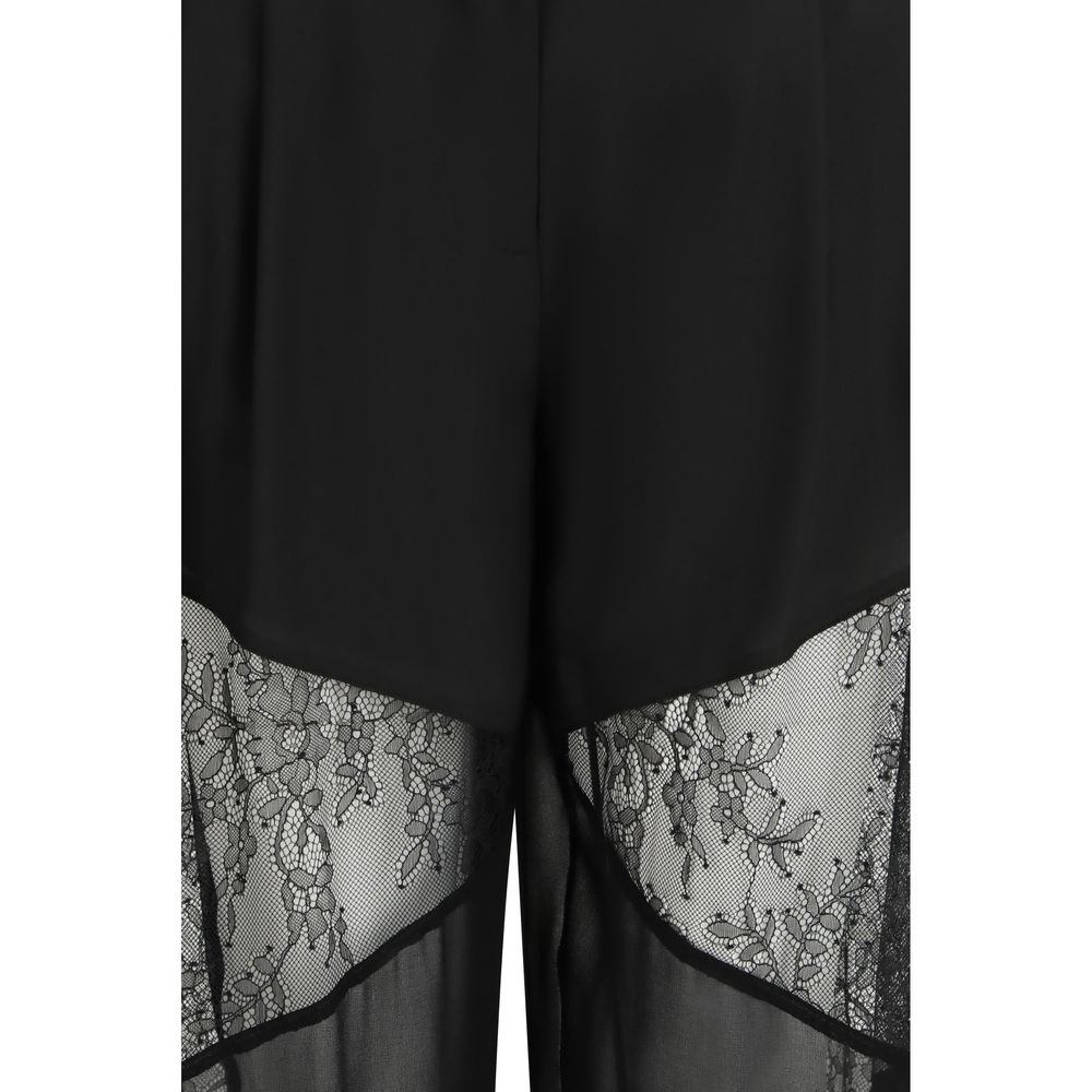 Elevate your wardrobe with PINKO's Black Polyester Casual Pants, a luxurious blend of tailored elegance and contemporary sophistication, perfect for any occasion.