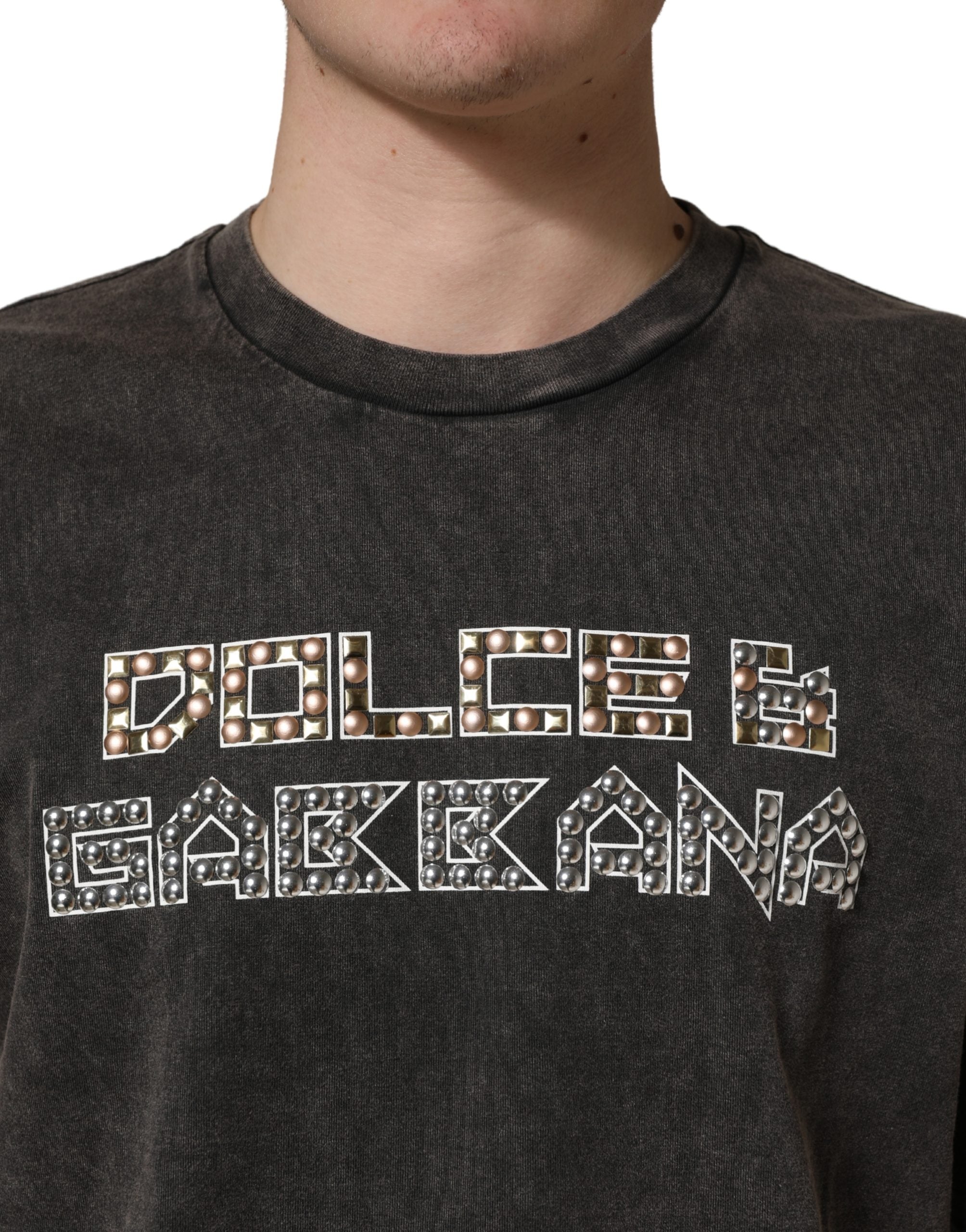 Indulge in the exquisite Dolce & Gabbana Gray Logo Embellished Men Crew Neck T-shirt, a testament to Italian craftsmanship and timeless elegance, perfect for the discerning individual.