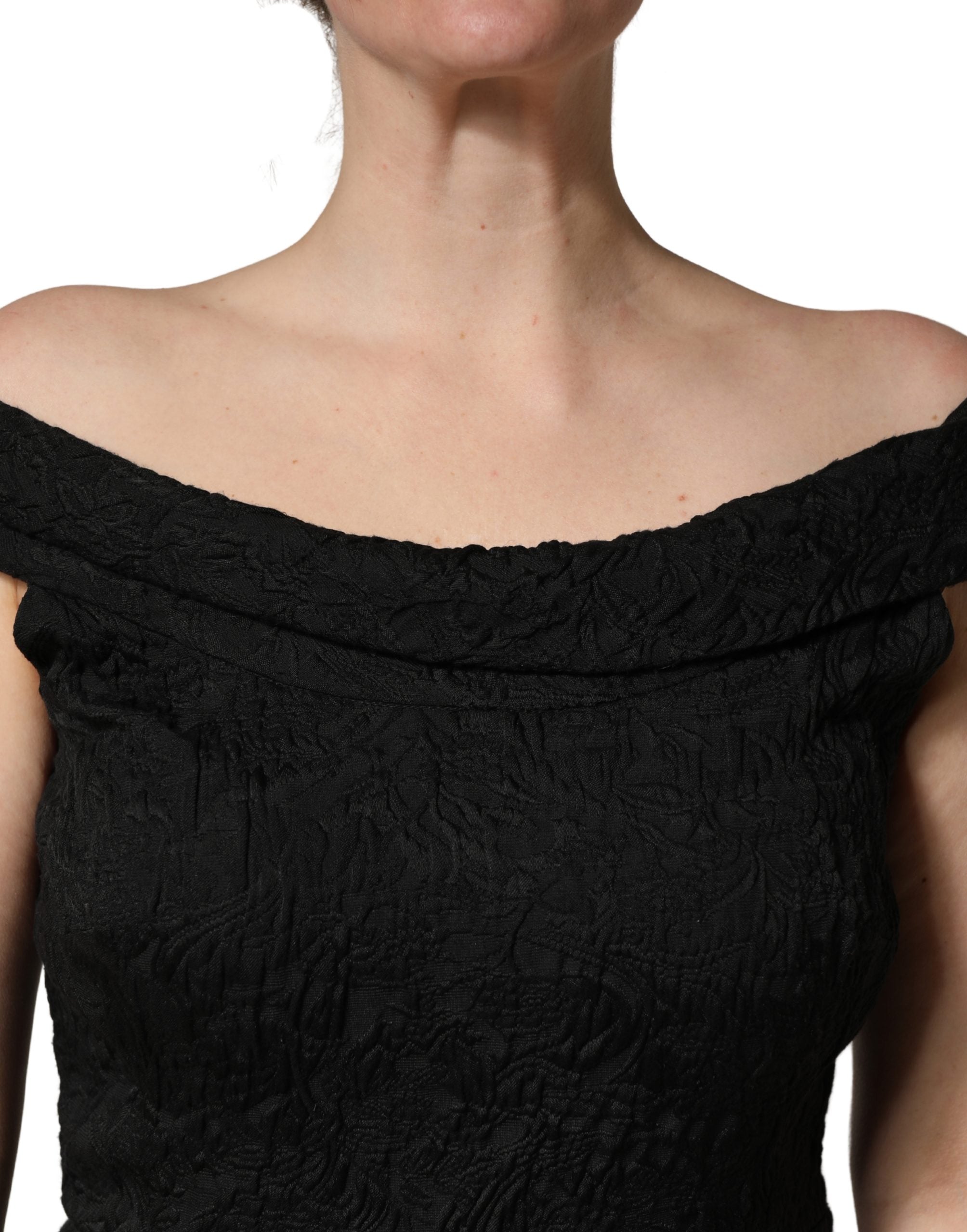 Elevate your presence with the Dolce & Gabbana Black Floral Brocade Sheath Mermaid Dress, a masterpiece of Italian craftsmanship that embodies timeless elegance and allure.
