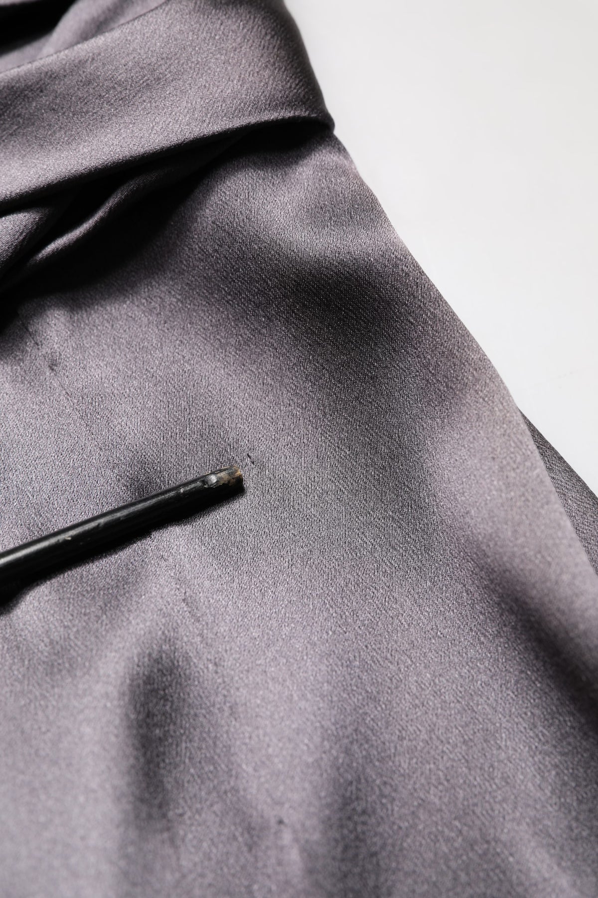 Indulge in the allure of the Dolce & Gabbana Black Satin Sleeveless Sweetheart Dress, a masterpiece of Italian craftsmanship that embodies elegance and sophistication for any occasion.