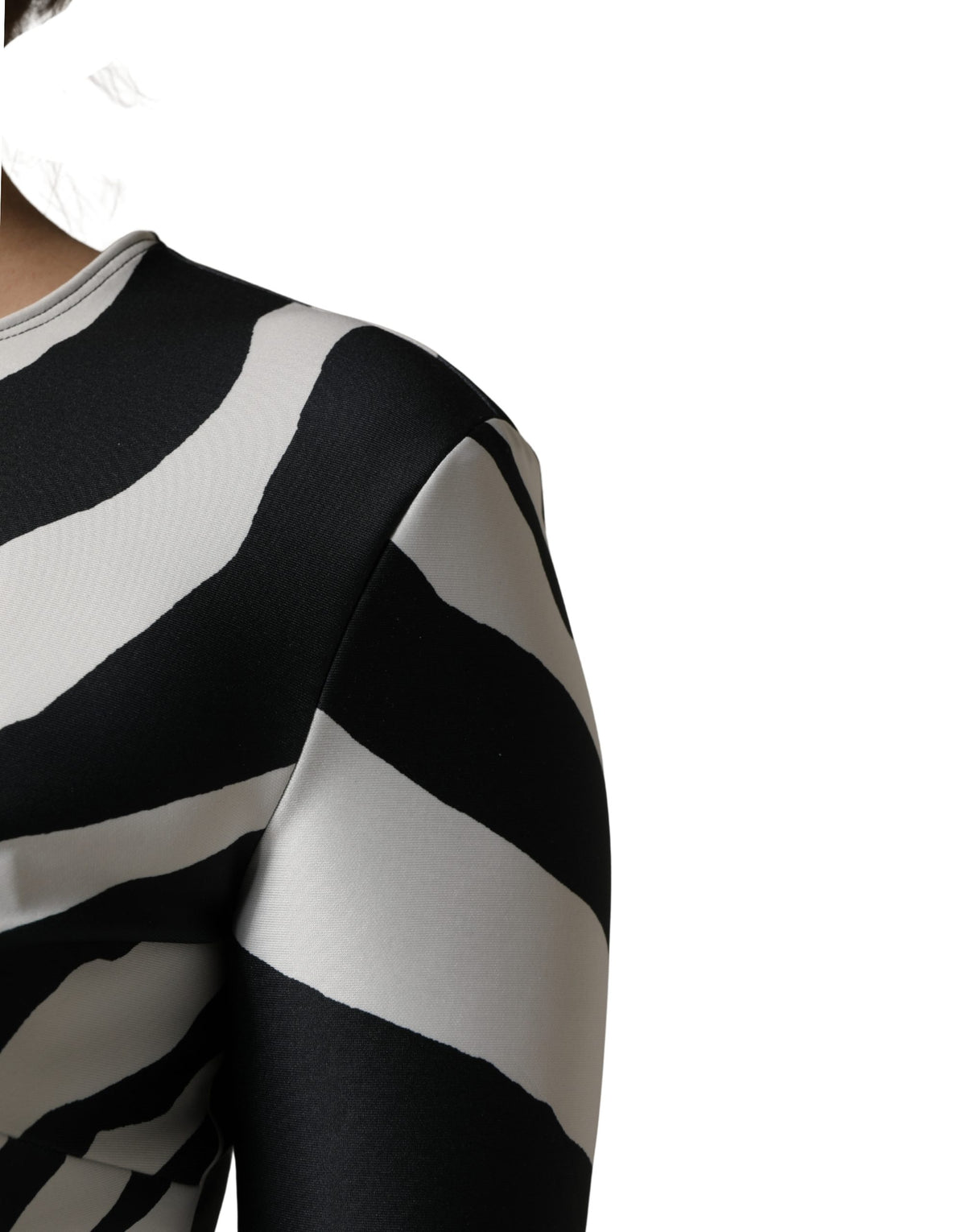Elevate your wardrobe with the Dolce & Gabbana Black White Zebra Pattern Jumpsuit, a luxurious blend of exquisite craftsmanship and bold elegance, perfect for any occasion.