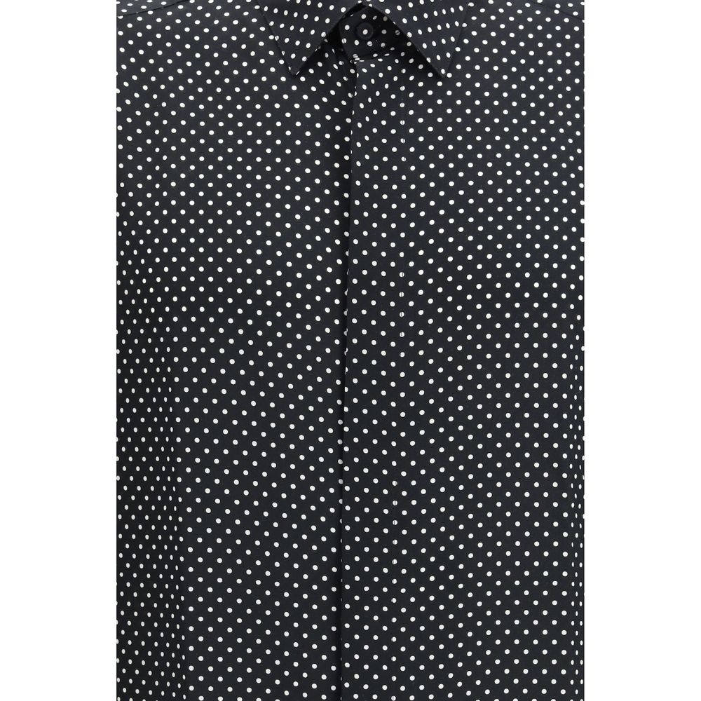 Elevate your style with the Tom Ford Black Silk Pattern Shirt, a luxurious blend of exquisite craftsmanship and timeless elegance, perfect for any refined occasion.