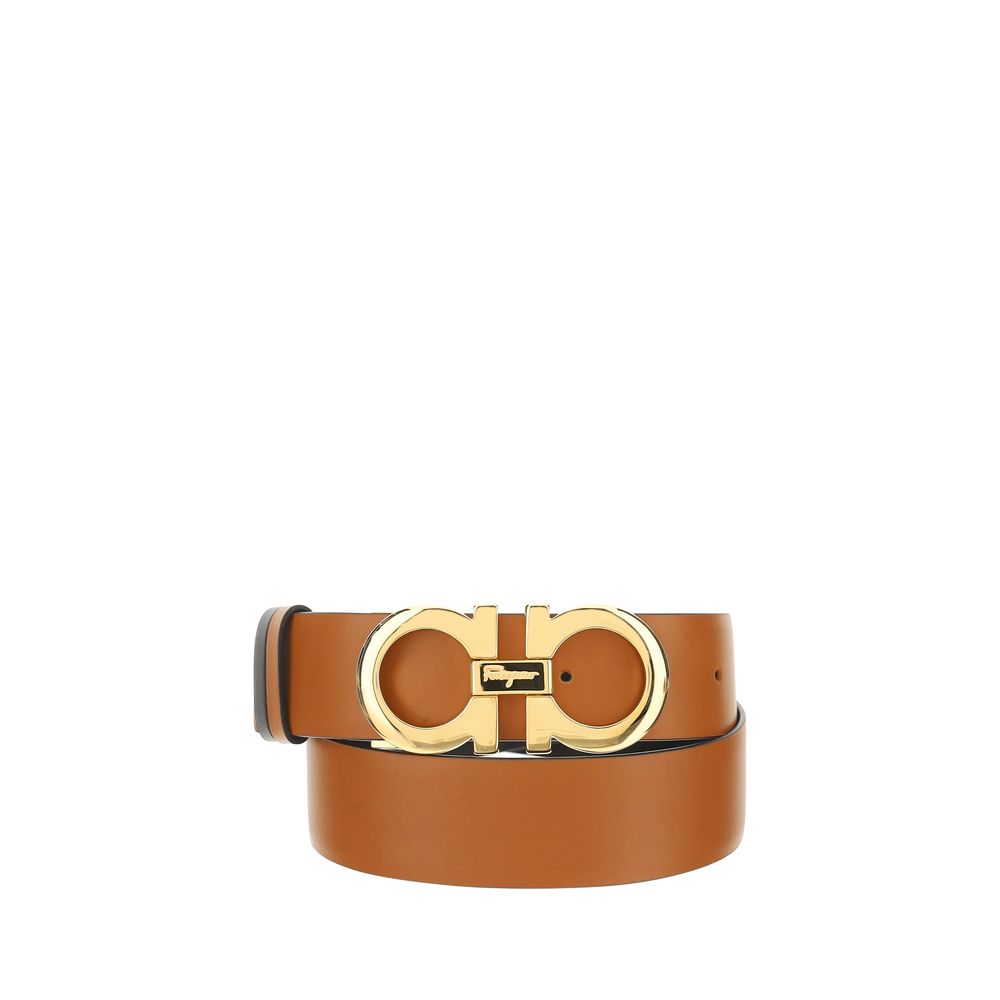 Elevate your style with the Ferragamo Brown Calf Leather Bos Taurus Regular Belt, a reversible masterpiece of exquisite craftsmanship that embodies luxury and sophistication.