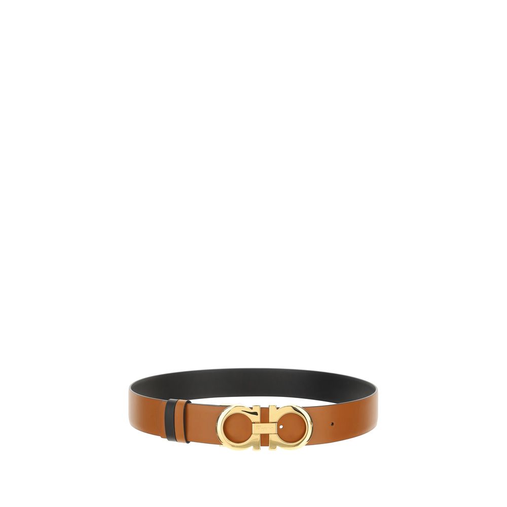 Elevate your style with the Ferragamo Brown Calf Leather Bos Taurus Regular Belt, a masterpiece of exquisite craftsmanship and timeless elegance, perfect for any sophisticated ensemble.