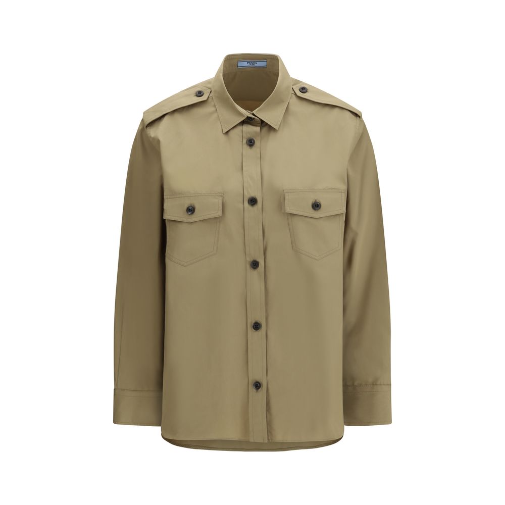 Elevate your wardrobe with the Prada Beige Cotton Shirt, a masterpiece of tailored precision and military-inspired elegance, crafted from luxurious 100% cotton.