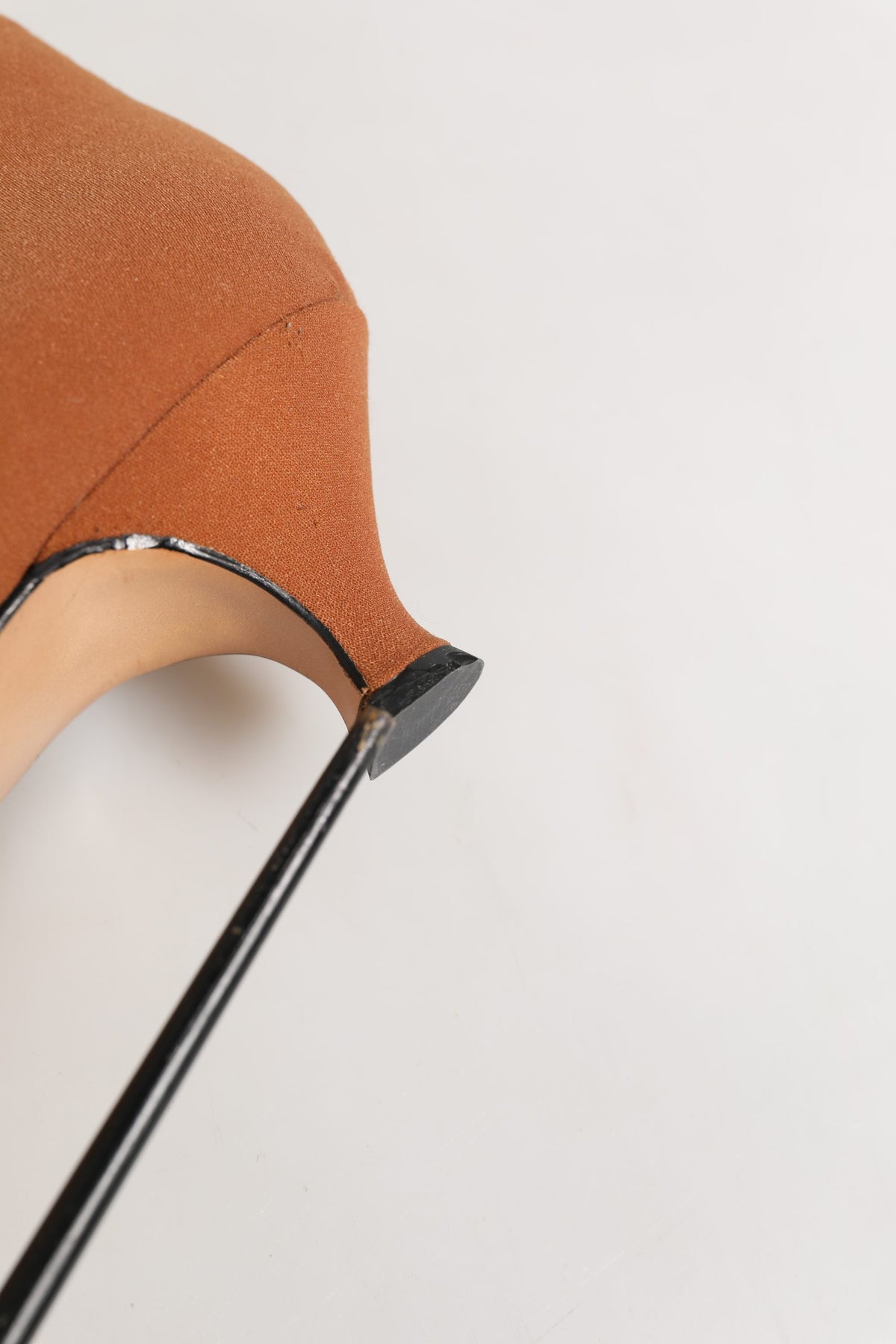 Step into the realm of elegance with Dolce & Gabbana's Brown Suede Ankle Boots, where Italian craftsmanship meets timeless allure, elevating your every ensemble.