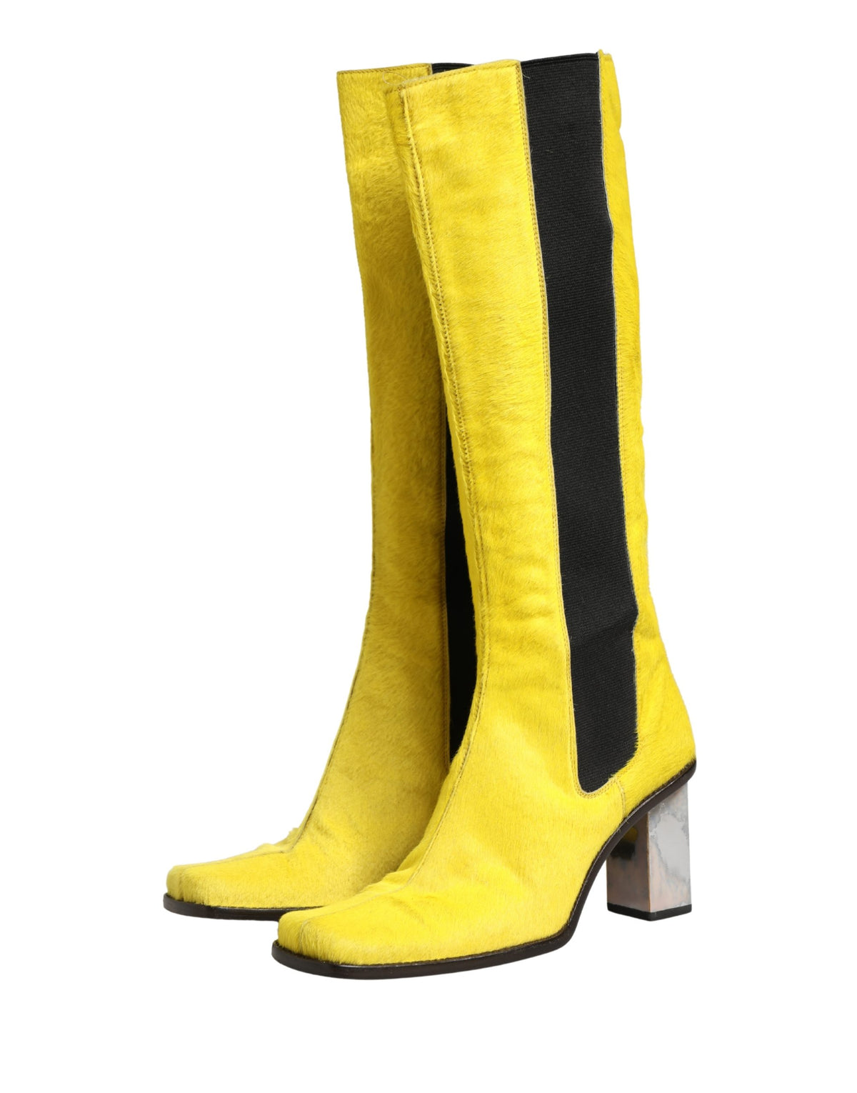 Step into a world of elegance with Dolce & Gabbana's knee-high boots, where exquisite leather artistry meets timeless Italian craftsmanship, perfect for any sophisticated occasion.