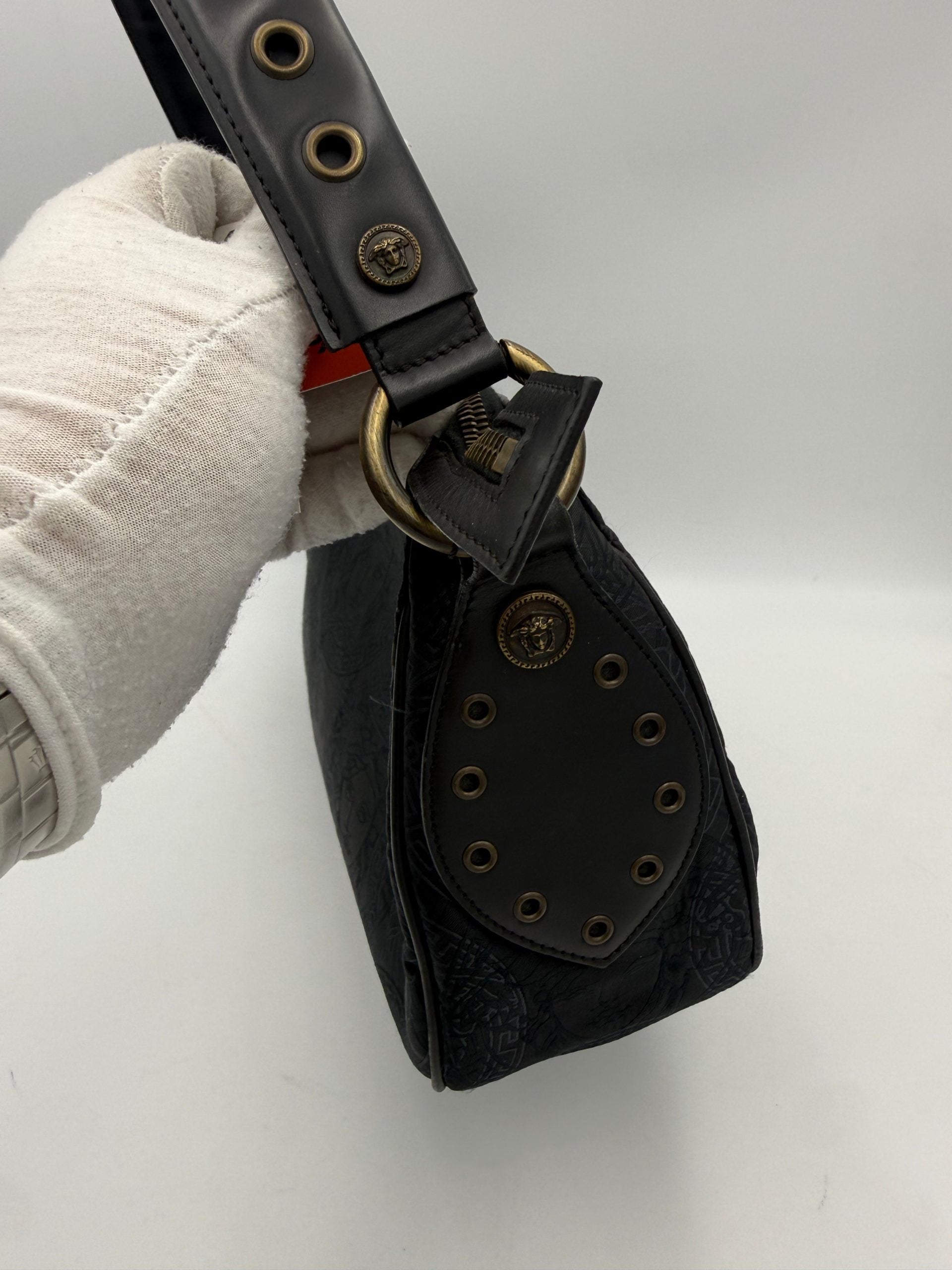 Elevate your style with the Versace VERSACE Medusa Jacquard Shoulder Bag, a luxurious blend of lightweight fabric and black leather, perfect for the modern connoisseur.