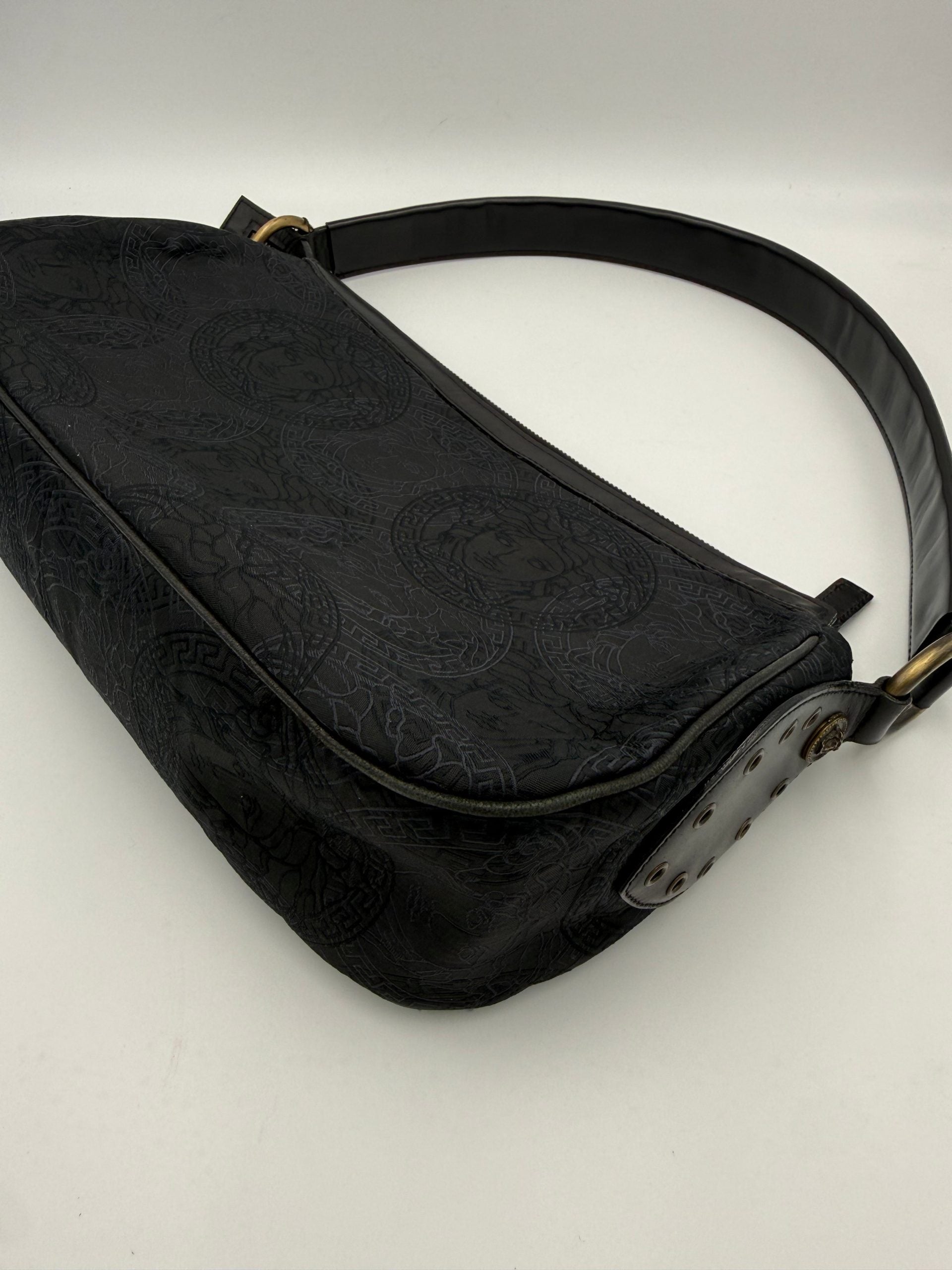 Elevate your style with the Versace VERSACE Medusa Jacquard Shoulder Bag, a masterpiece of luxurious craftsmanship and timeless elegance, perfect for any occasion.