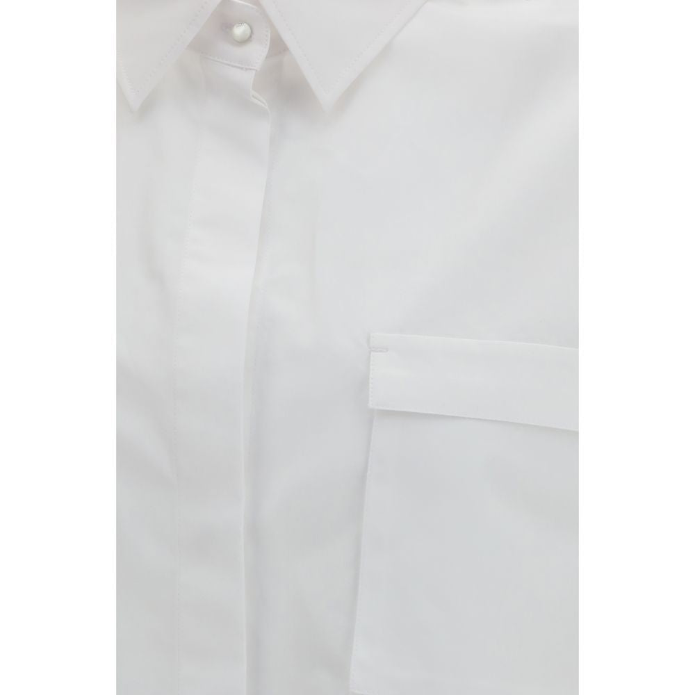 Elevate your wardrobe with the Max Mara White Cotton Shirt, a timeless piece crafted from 100% cotton, embodying sophistication and modern elegance for every occasion.