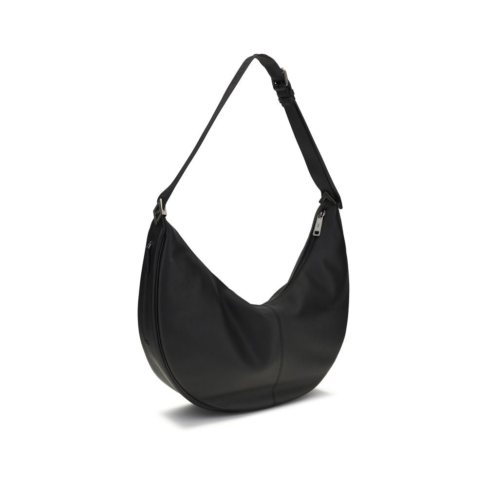 Elevate your style with the Fendi Black Calf Leather Bos Taurus Shoulder Bag, a masterpiece of elegance and craftsmanship that embodies luxury and sophistication.