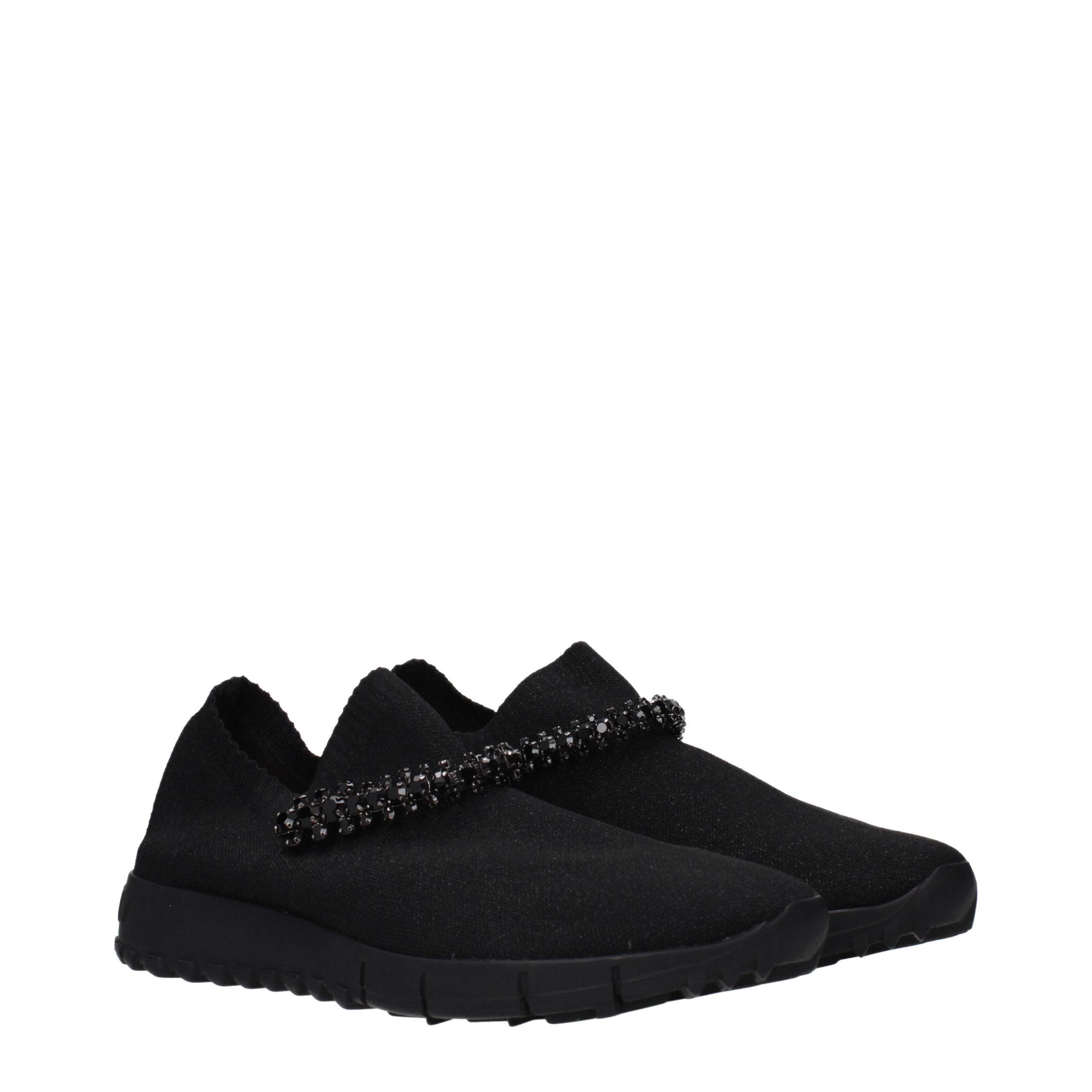 Experience the allure of Jimmy Choo Black Fabric Slip-On Loafers, where exquisite craftsmanship meets timeless elegance, perfect for the discerning individual.