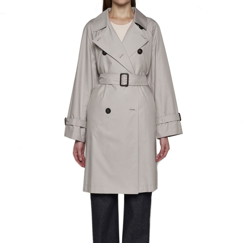Discover the Max Mara Beige Cotton Coat, a masterpiece of couture blending elegance and comfort, crafted in Italy for the discerning individual who values timeless luxury.