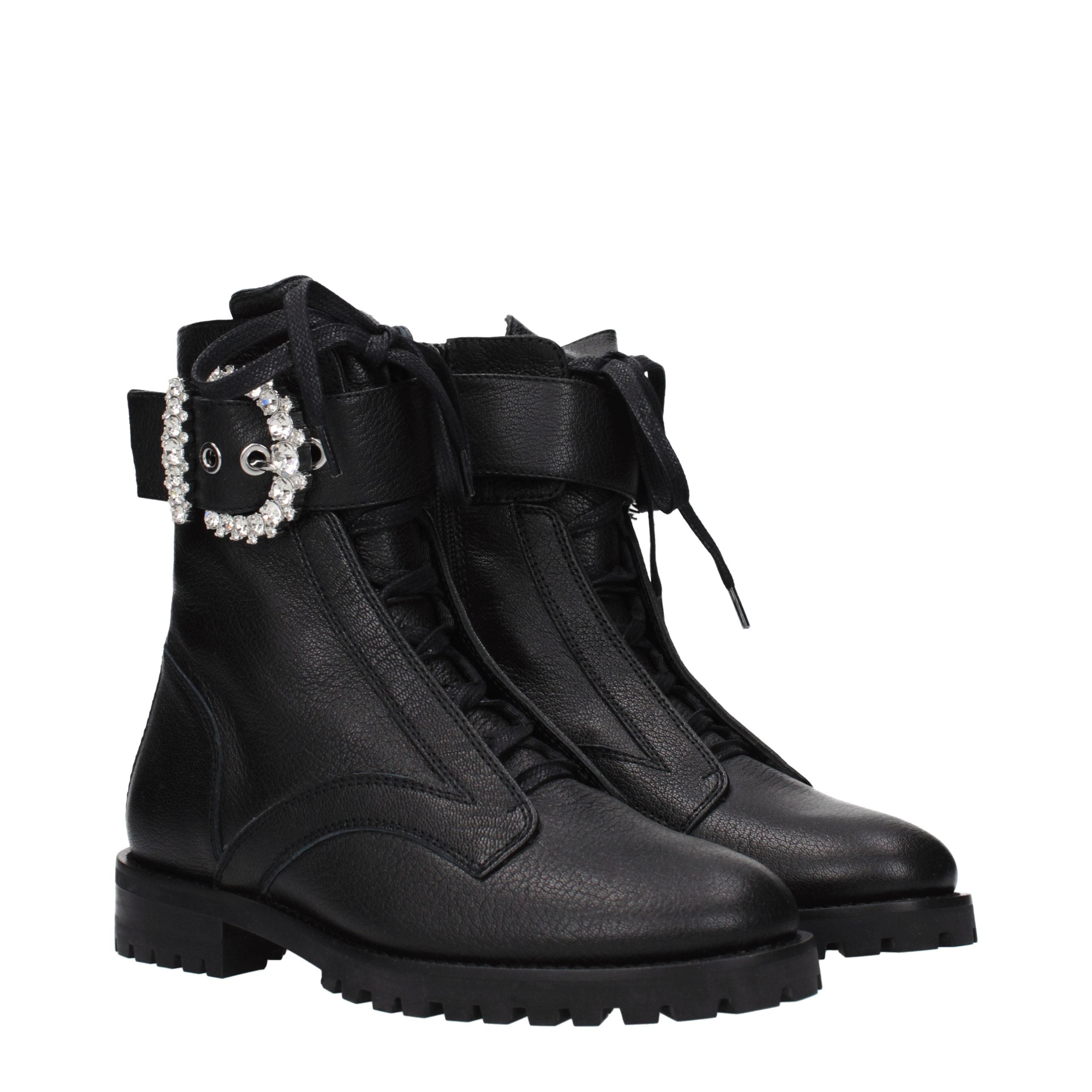 Indulge in the exquisite craftsmanship of Jimmy Choo Black Leather Ankle Boots, where timeless elegance meets bold sophistication, perfect for any luxurious occasion.