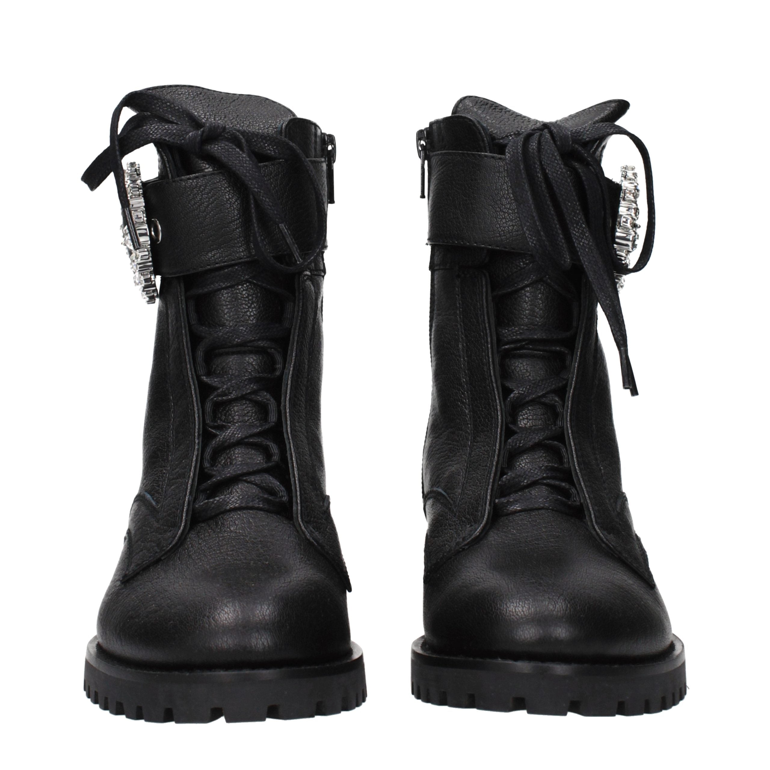 Indulge in the exquisite craftsmanship of Jimmy Choo Black Leather Ankle Boots, a timeless luxury that elevates your style and embodies refined allure.