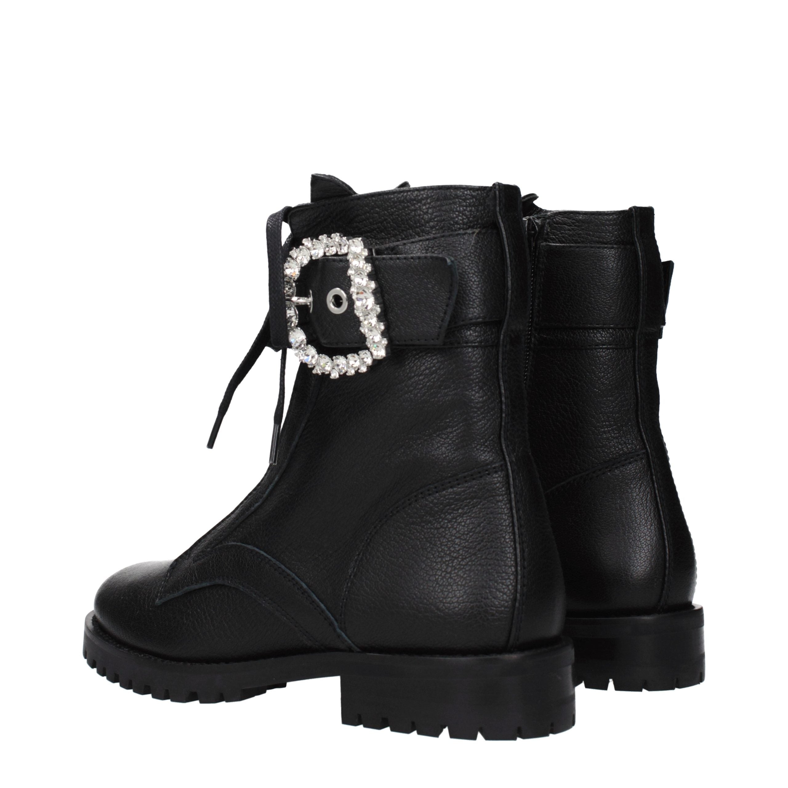 Indulge in the exquisite craftsmanship of Jimmy Choo Black Leather Ankle Boots, where timeless elegance meets bold sophistication, perfect for the discerning fashion connoisseur.