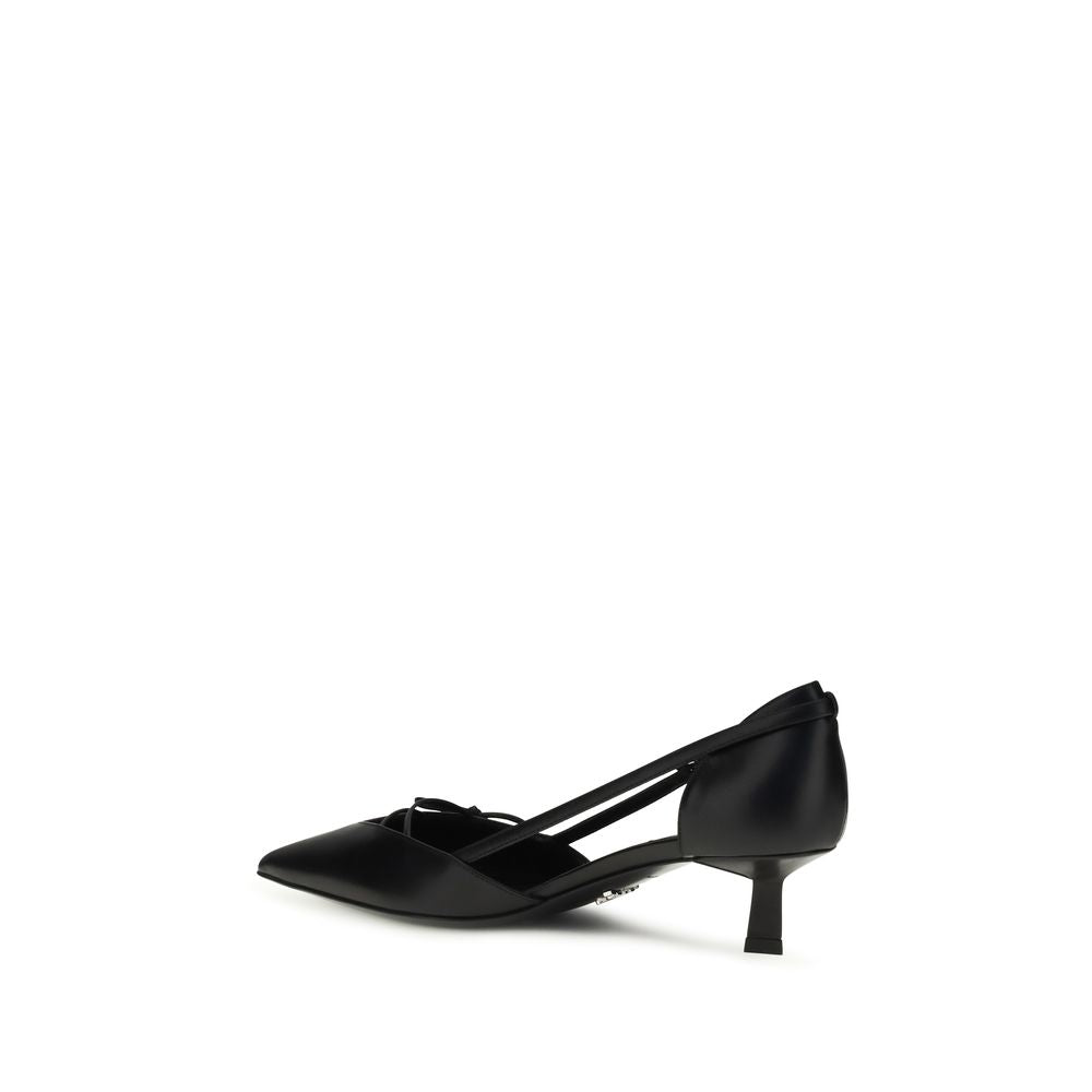 Elevate your elegance with Prada's Black Calf Leather Bos Taurus Mid Heel Pumps, a masterpiece of craftsmanship and timeless allure for the discerning individual.